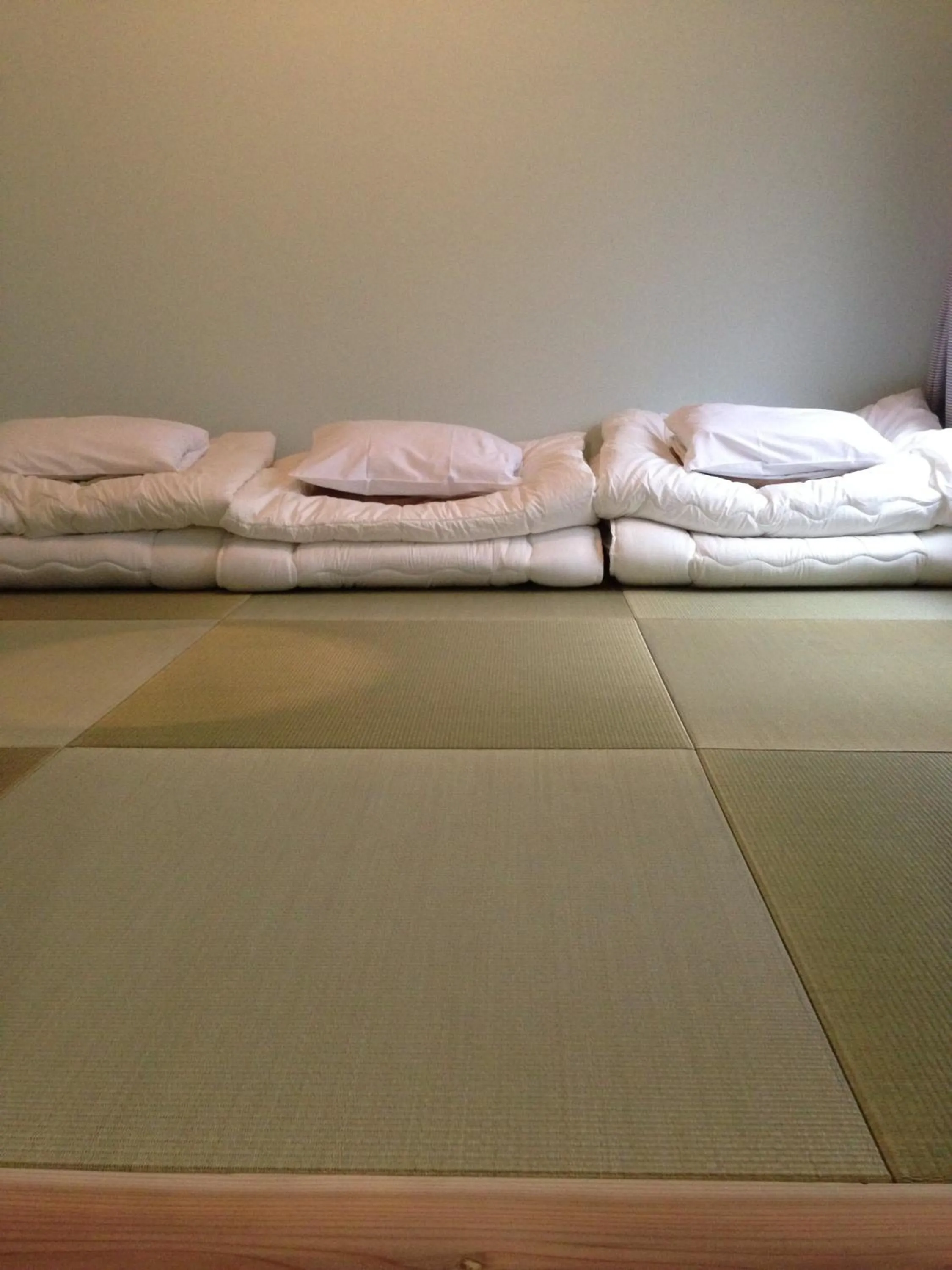 Decorative detail, Bed in Kamp Houkan-cho Backpacker's Inn & Lounge