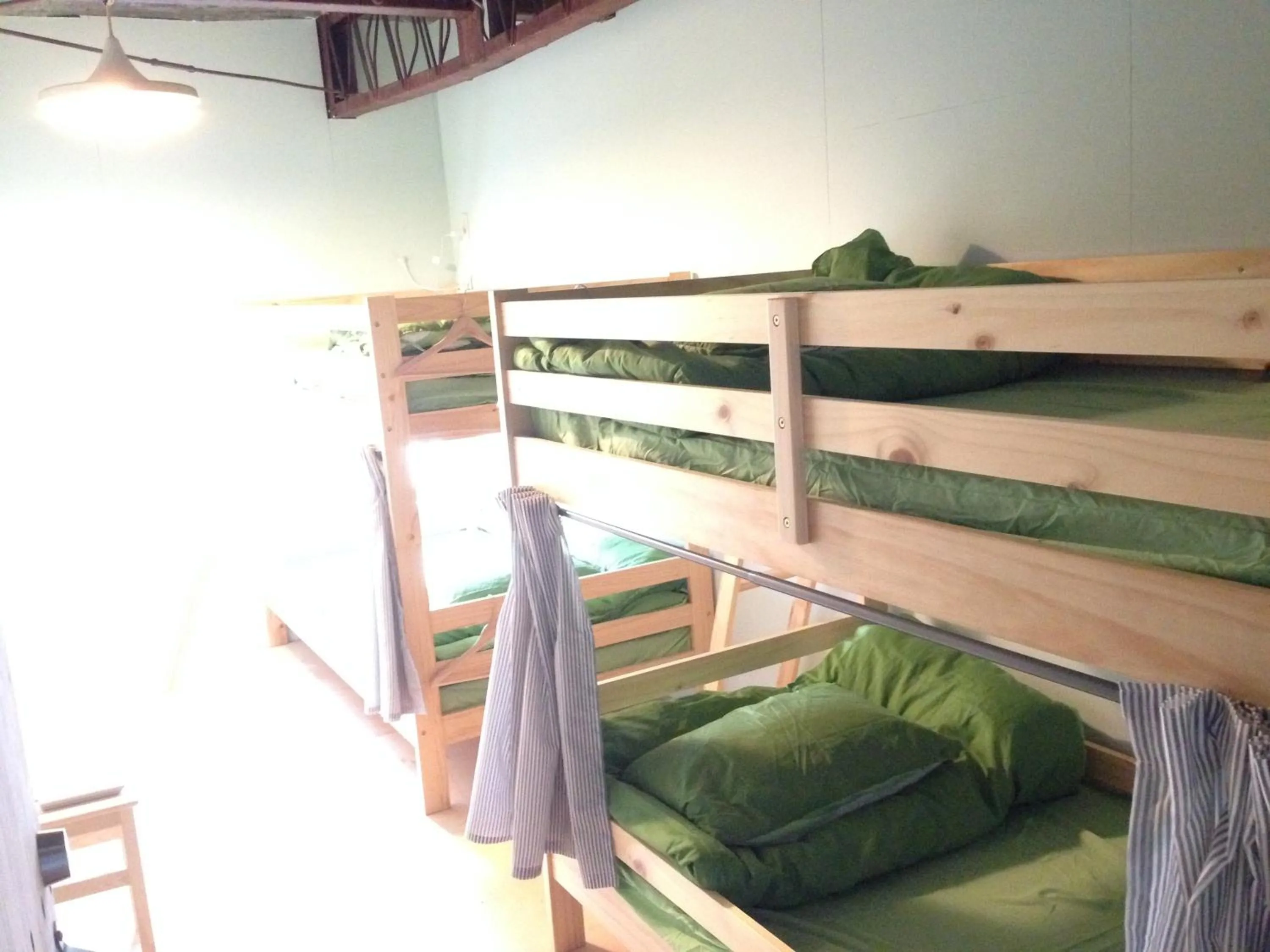 Bed in Kamp Houkan-cho Backpacker's Inn & Lounge