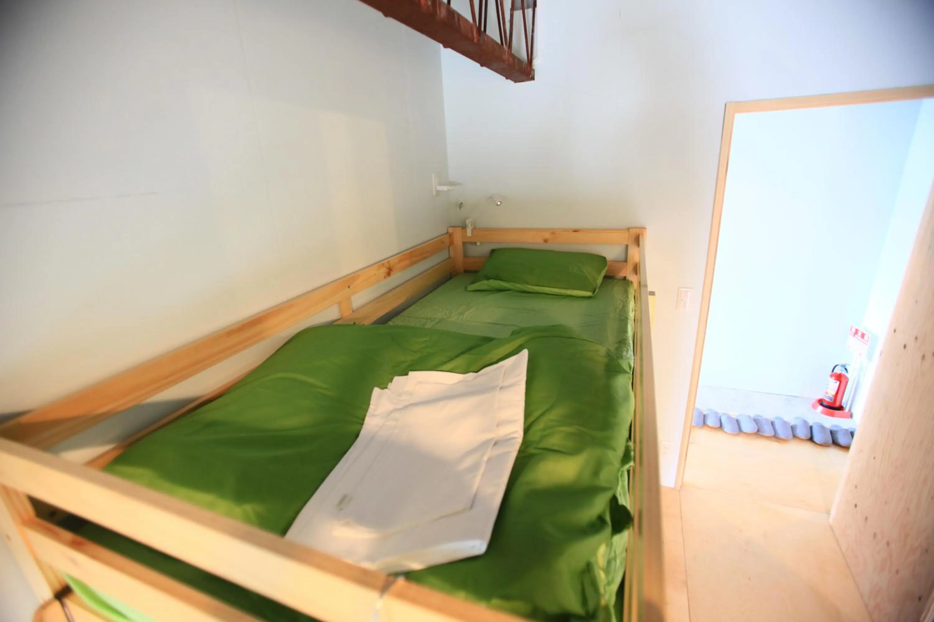 Bed in Kamp Houkan-cho Backpacker's Inn & Lounge