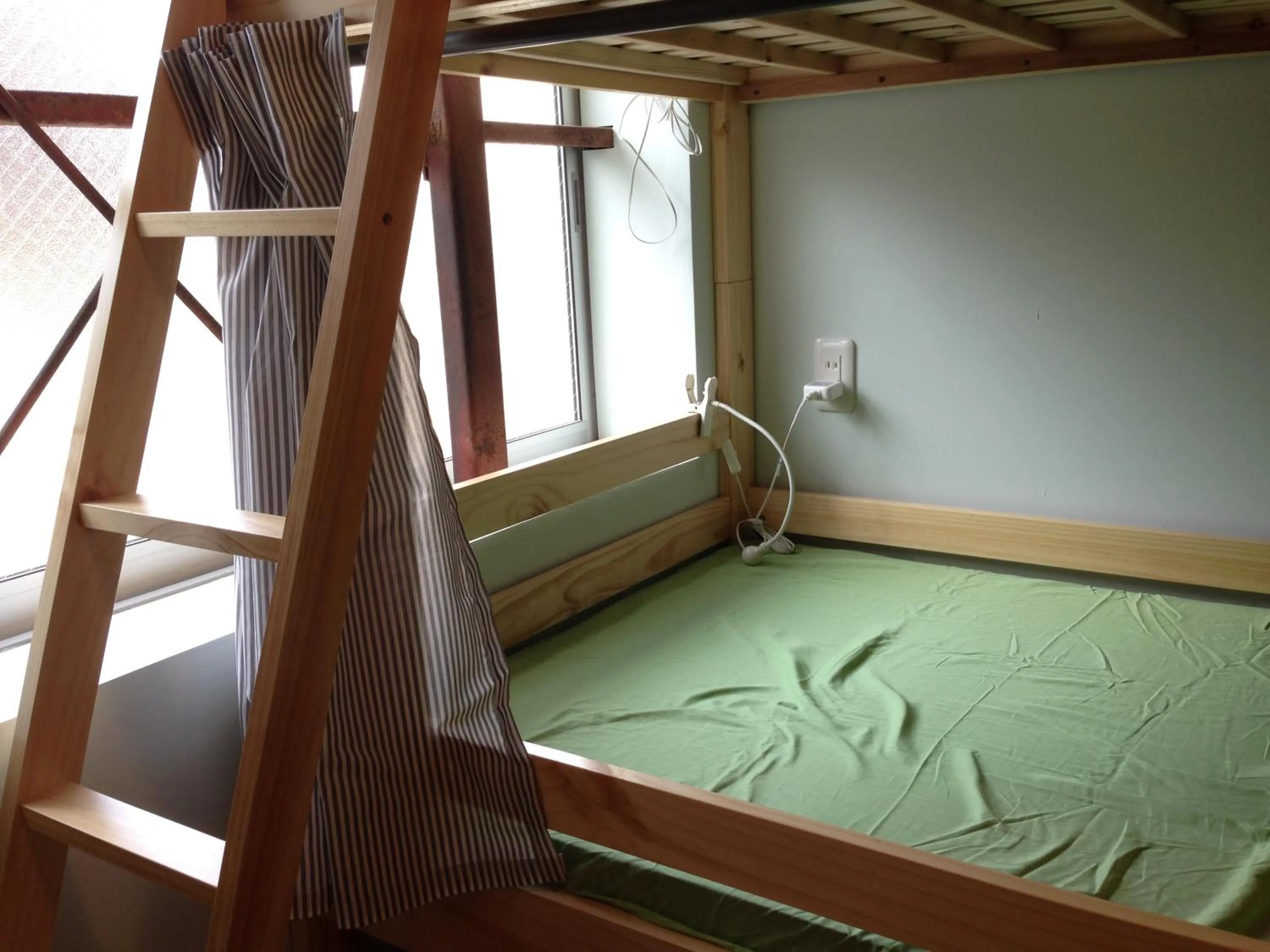 Bed in Kamp Houkan-cho Backpacker's Inn & Lounge