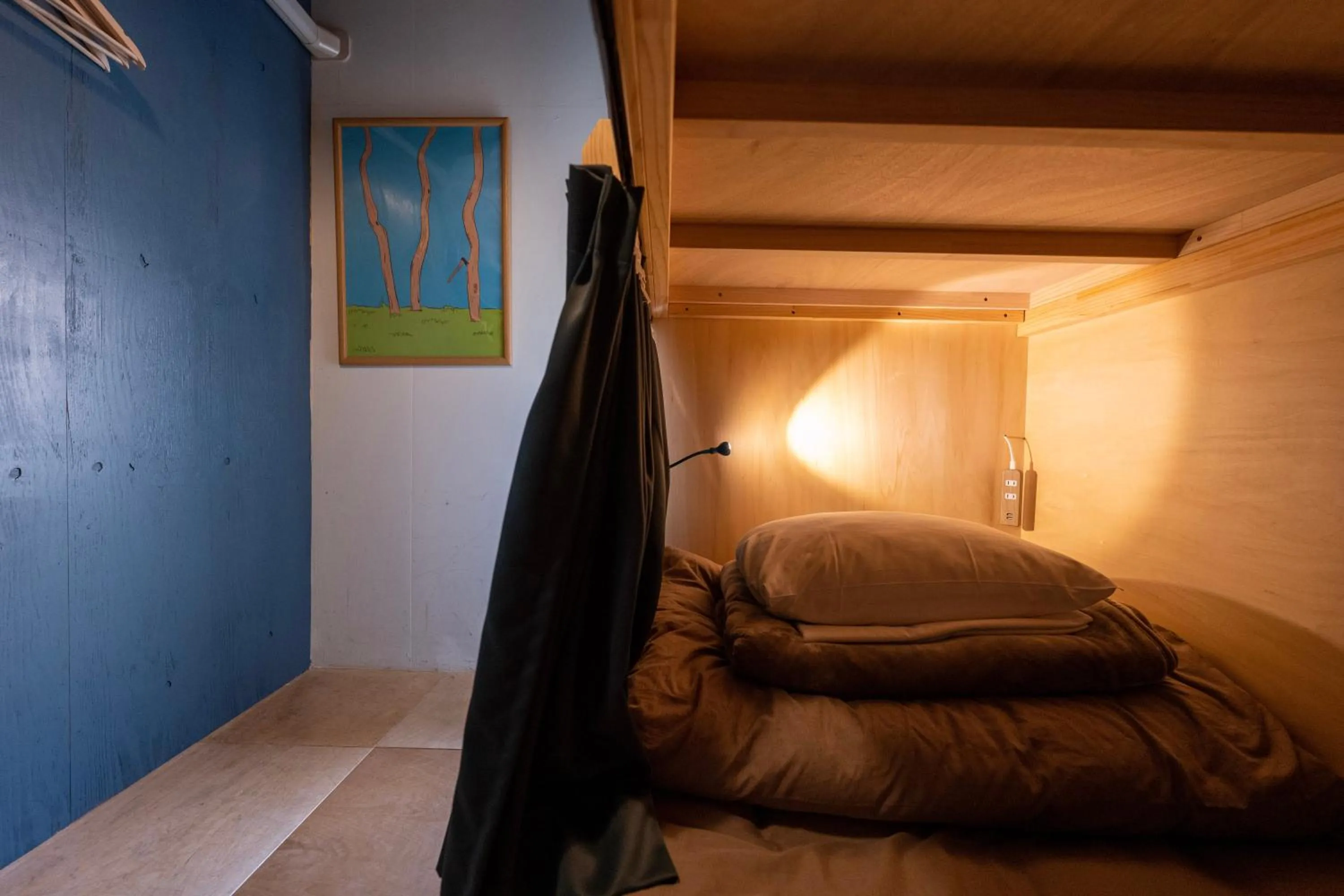 Bed in Kamp Houkan-cho Backpacker's Inn & Lounge