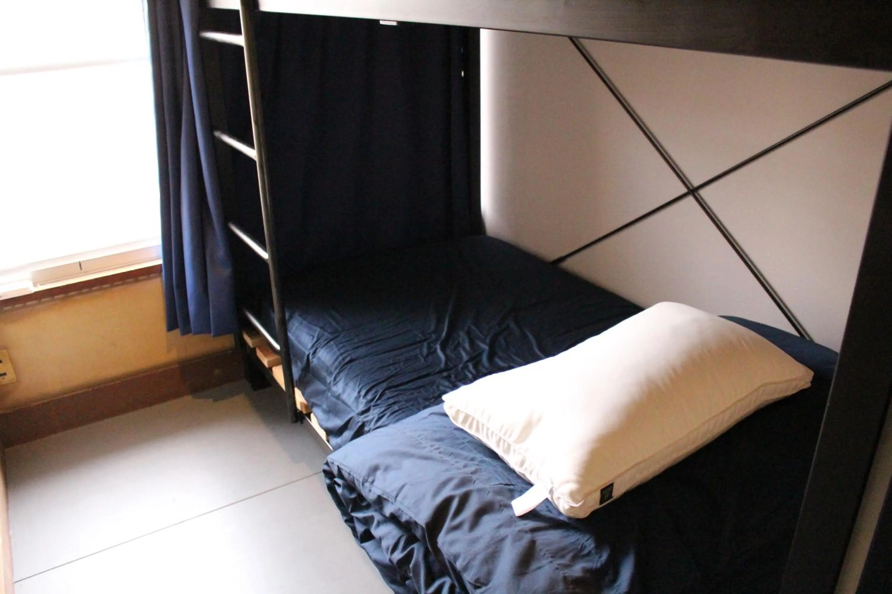 bunk bed, Bed in Kamp Houkan-cho Backpacker's Inn & Lounge