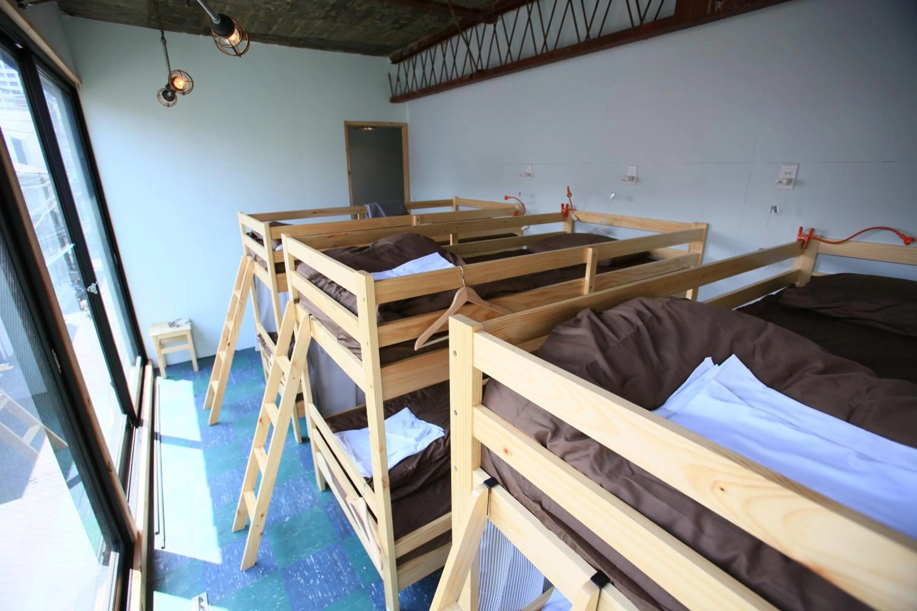 Decorative detail, Bed in Kamp Houkan-cho Backpacker's Inn & Lounge