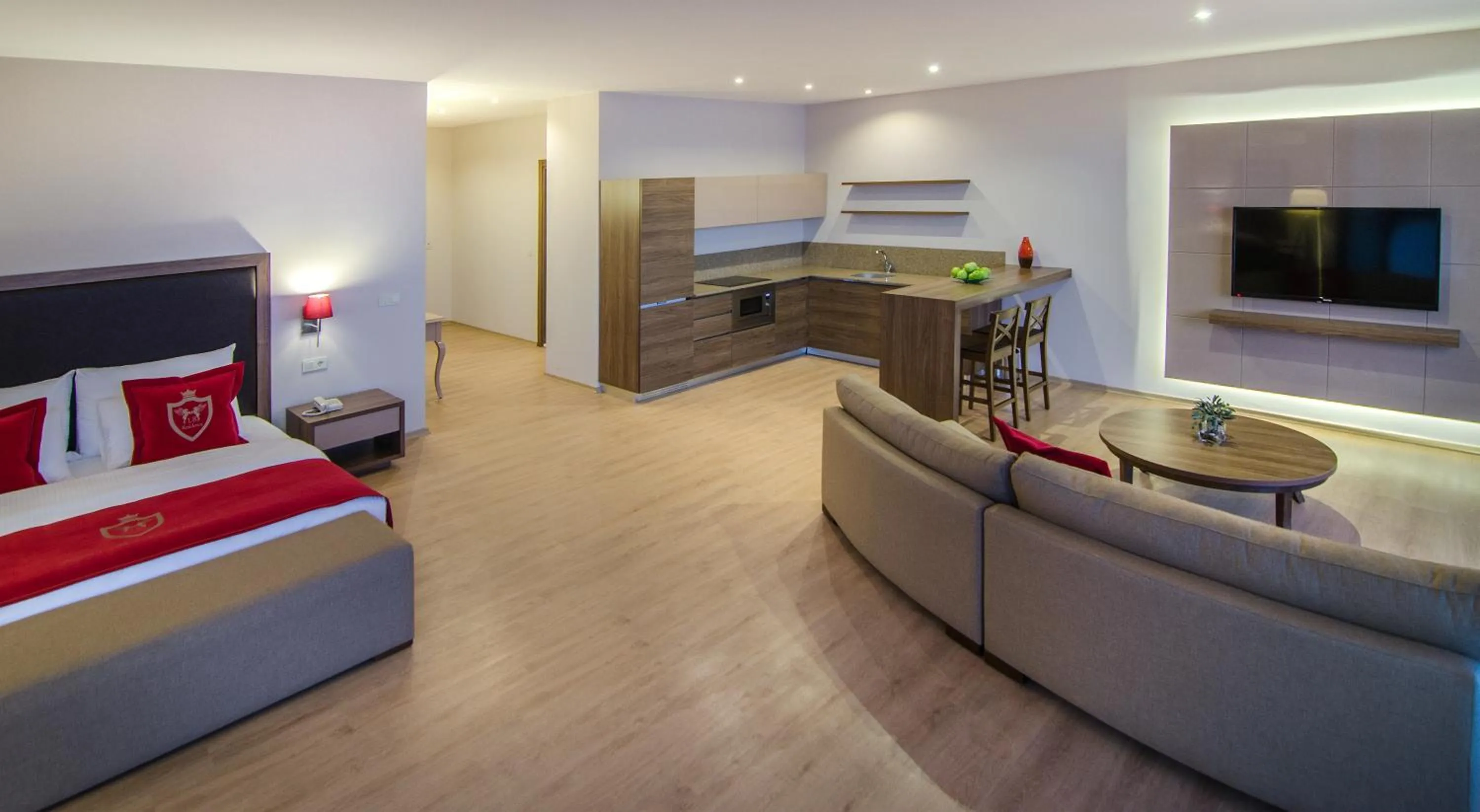 Kitchen or kitchenette, Bed in Ladies Beach Suite Hotel