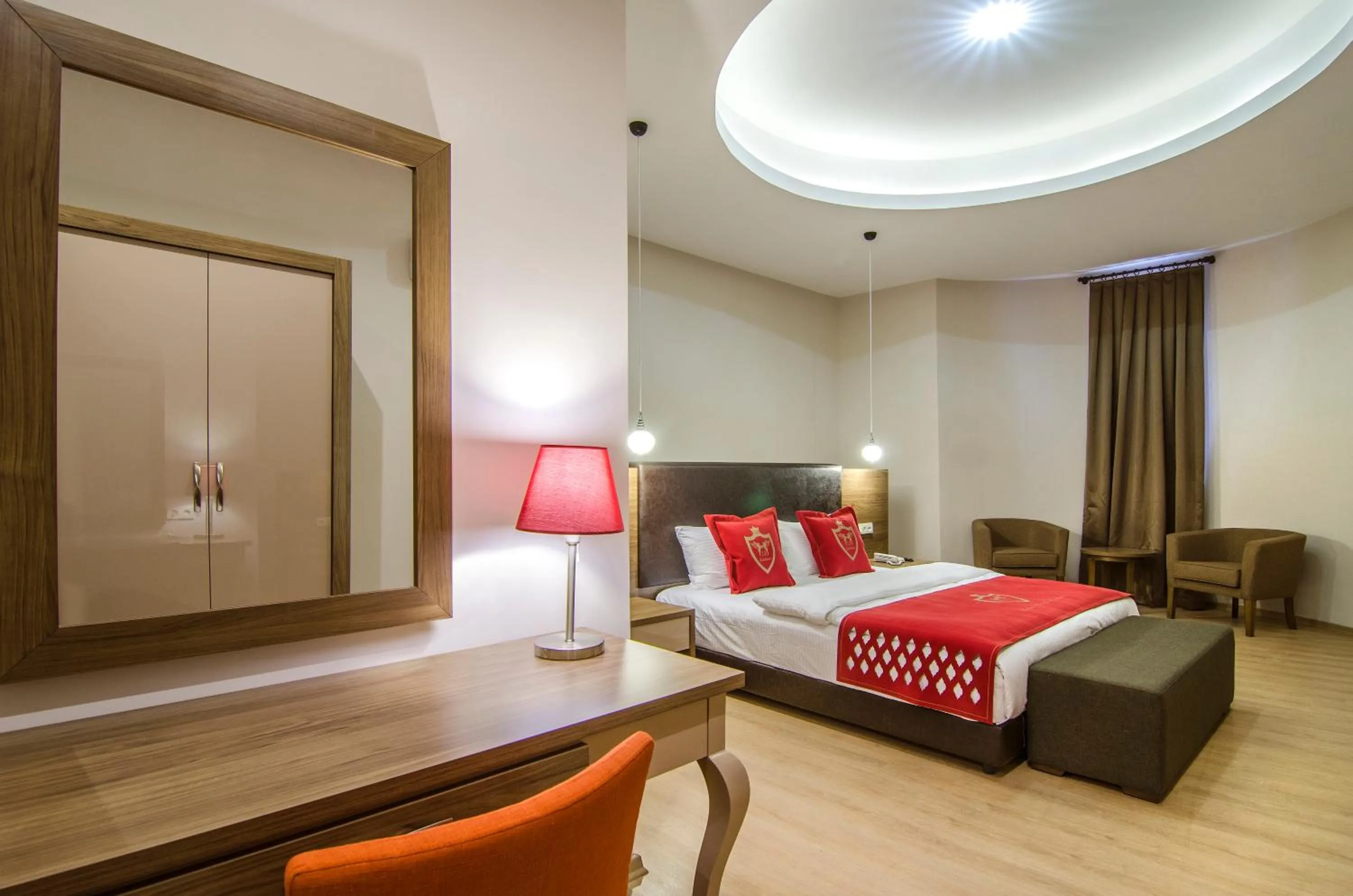 Seating area, Bed in Ladies Beach Suite Hotel