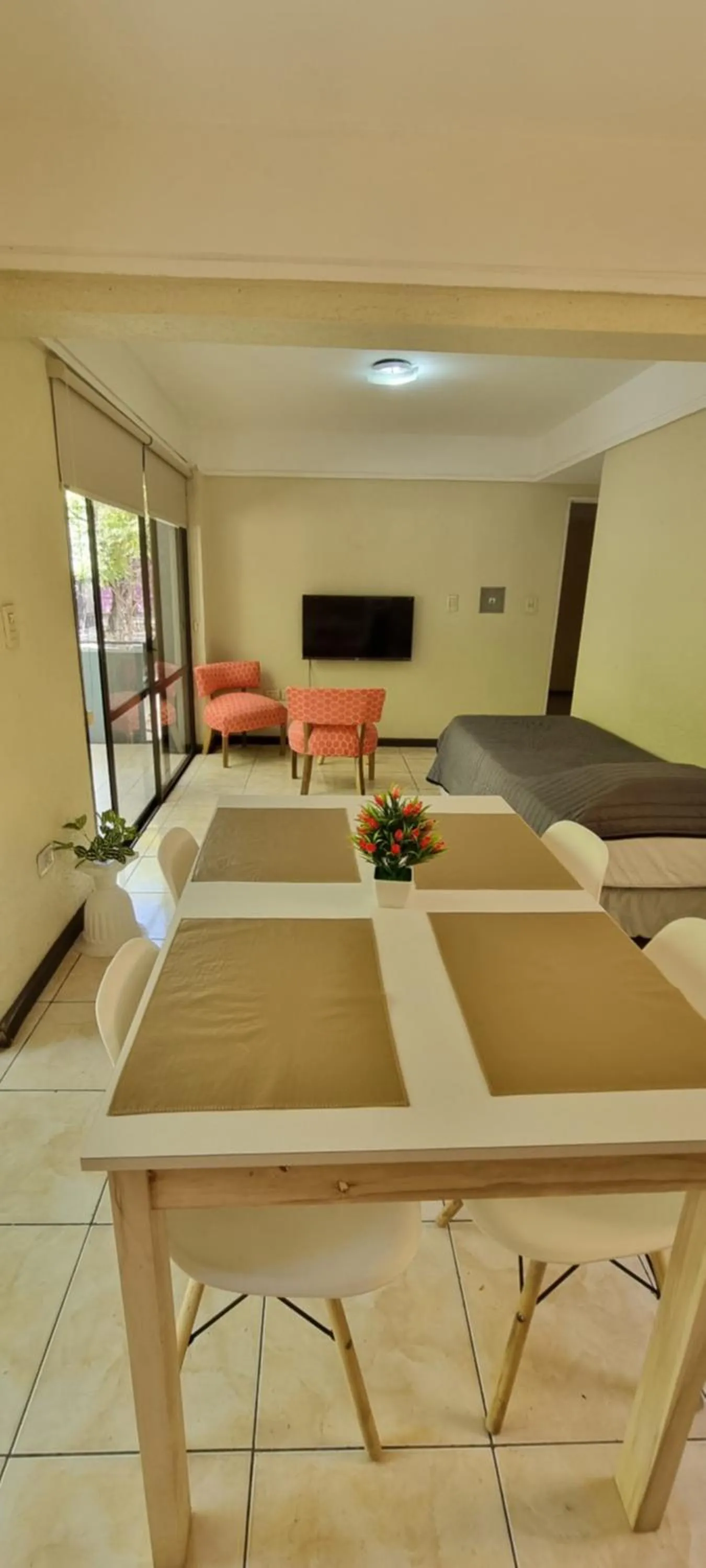 Dining area, Bed in Apex Apart
