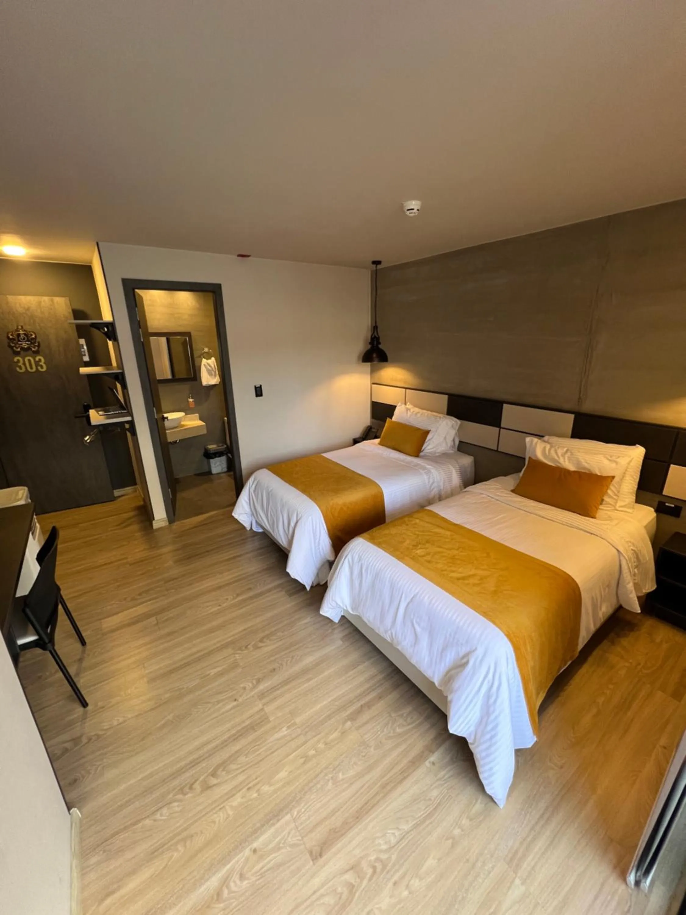 Bed in Balmoral Plaza Hotel