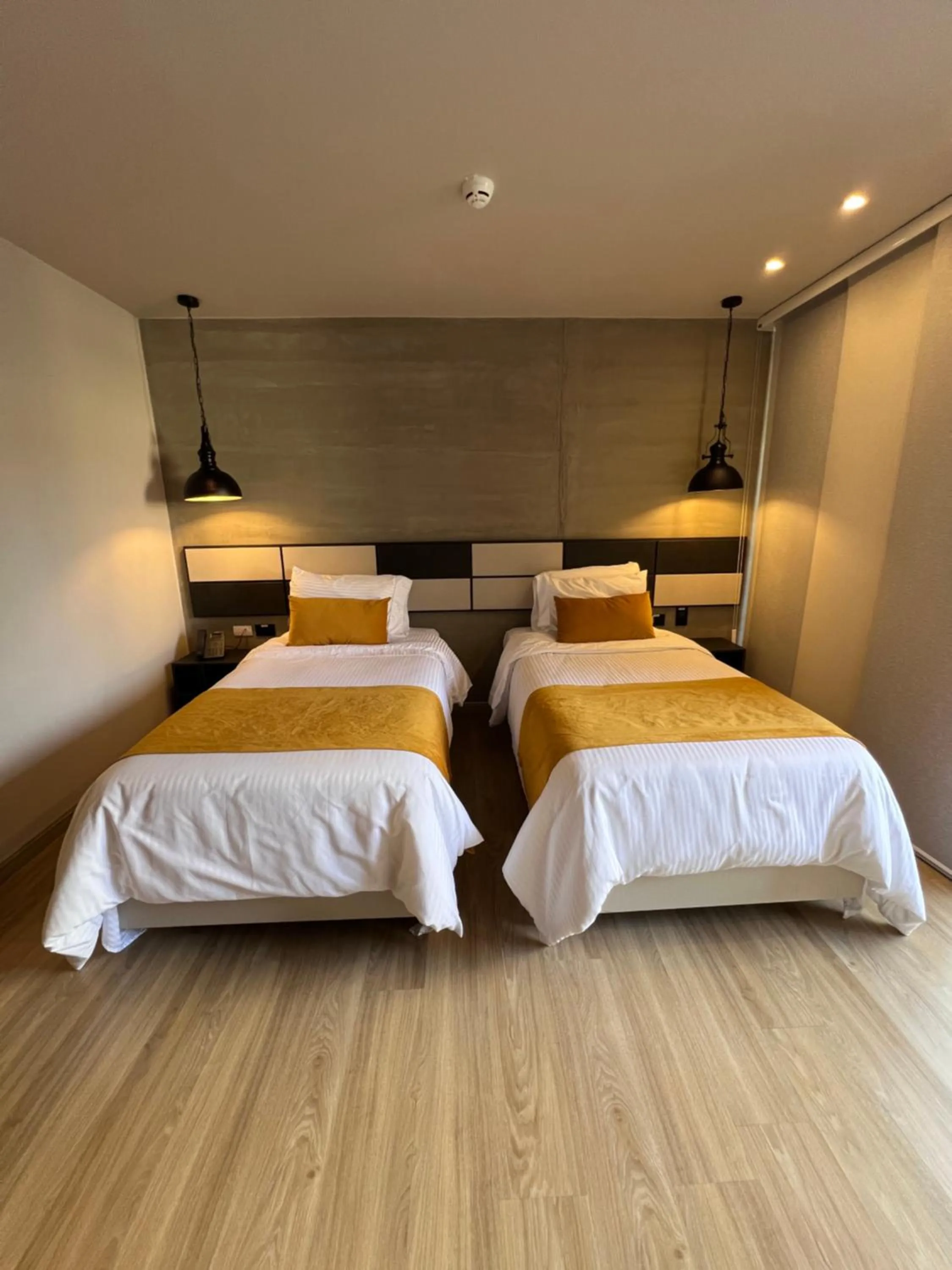 Bed in Balmoral Plaza Hotel