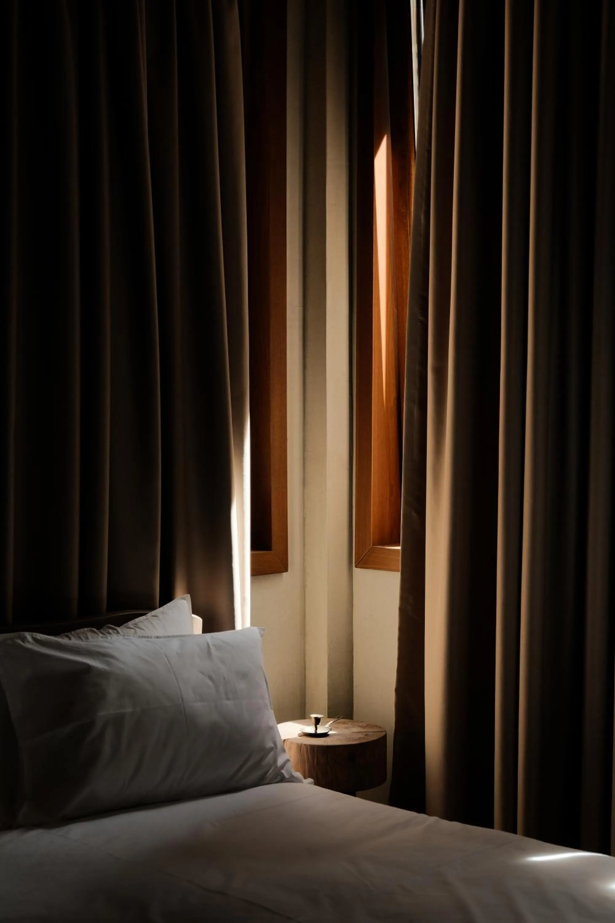 Bed in Faces & Places Boutique Hotel