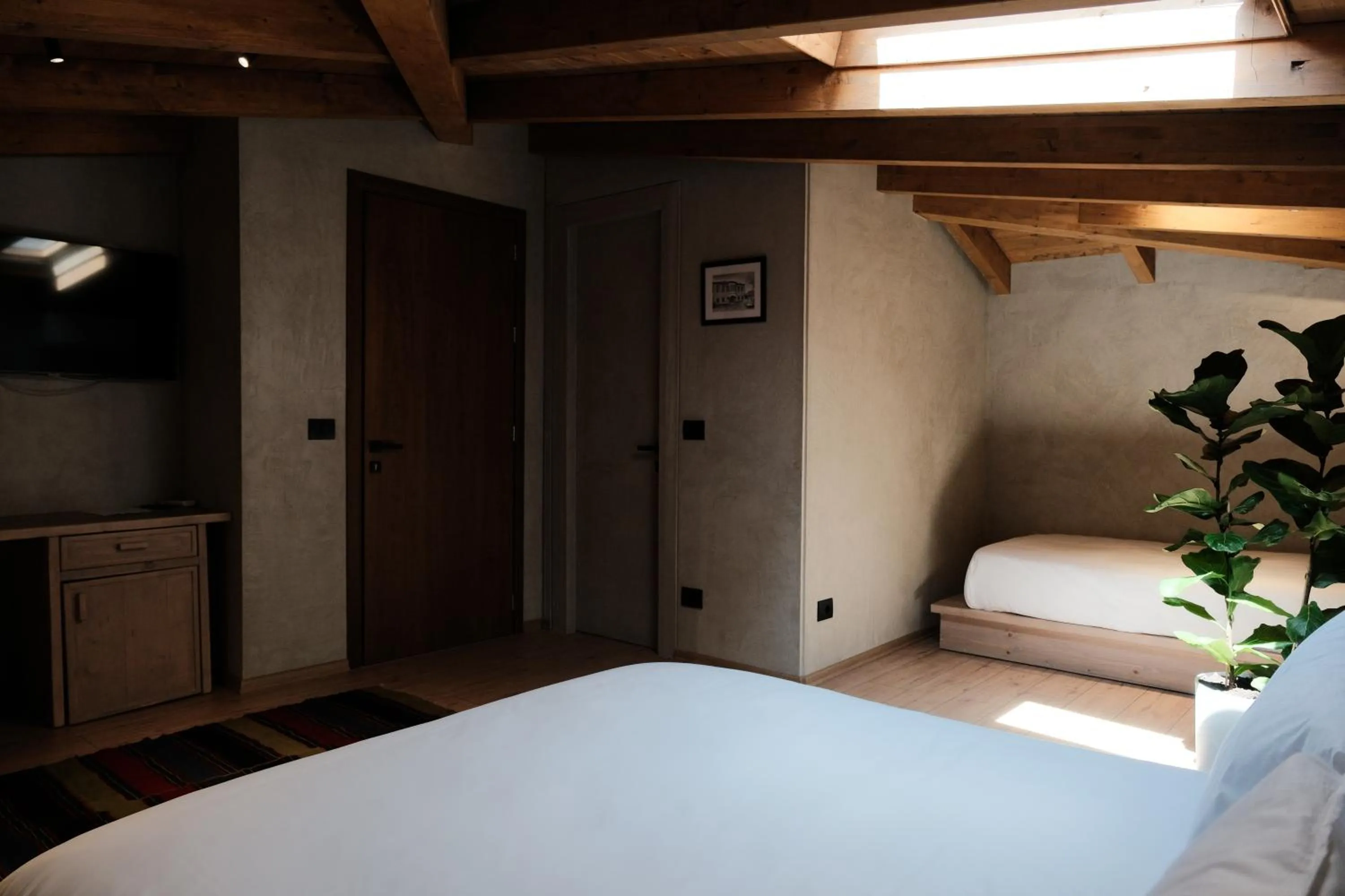 Bed in Faces & Places Boutique Hotel