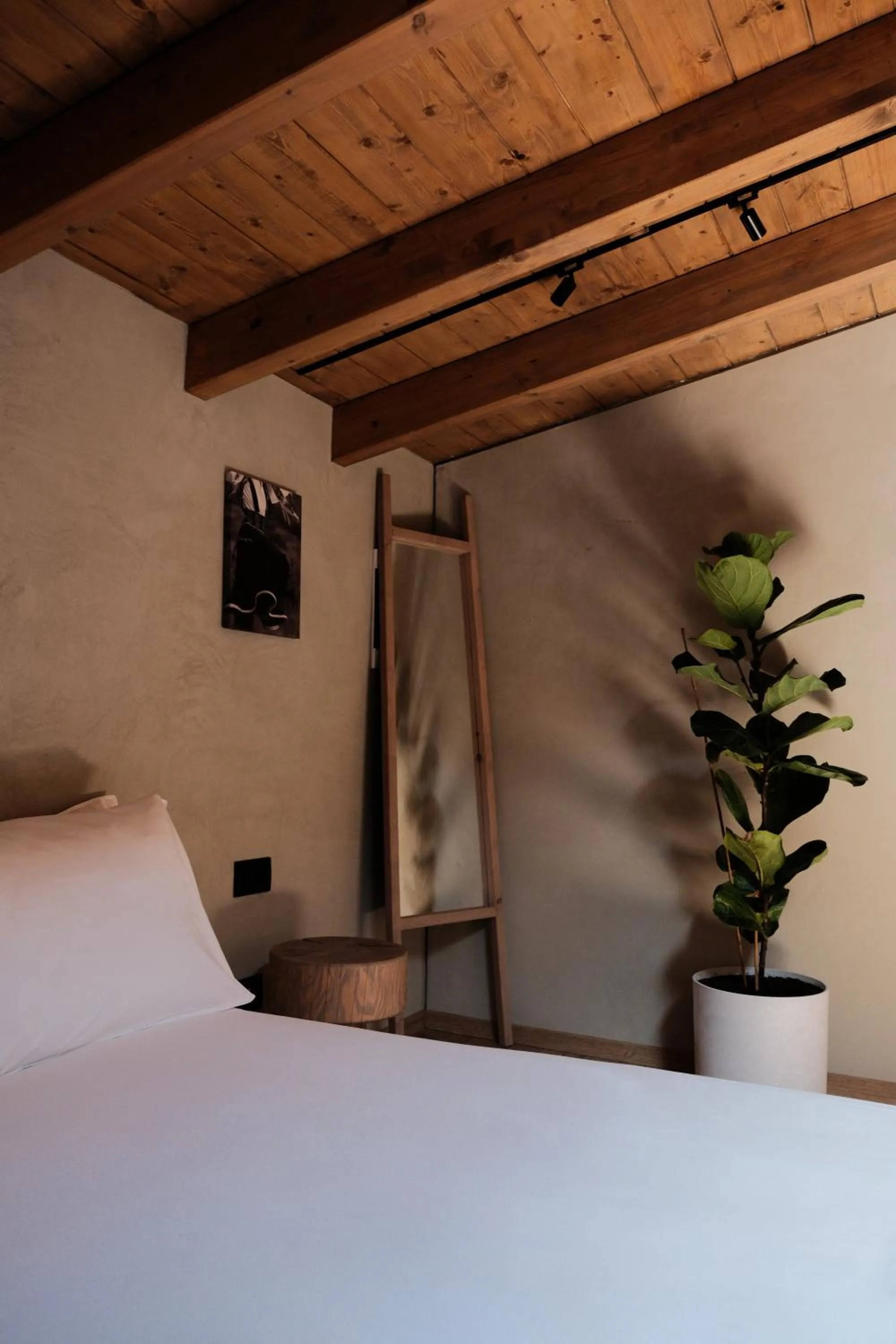 Bed in Faces & Places Boutique Hotel