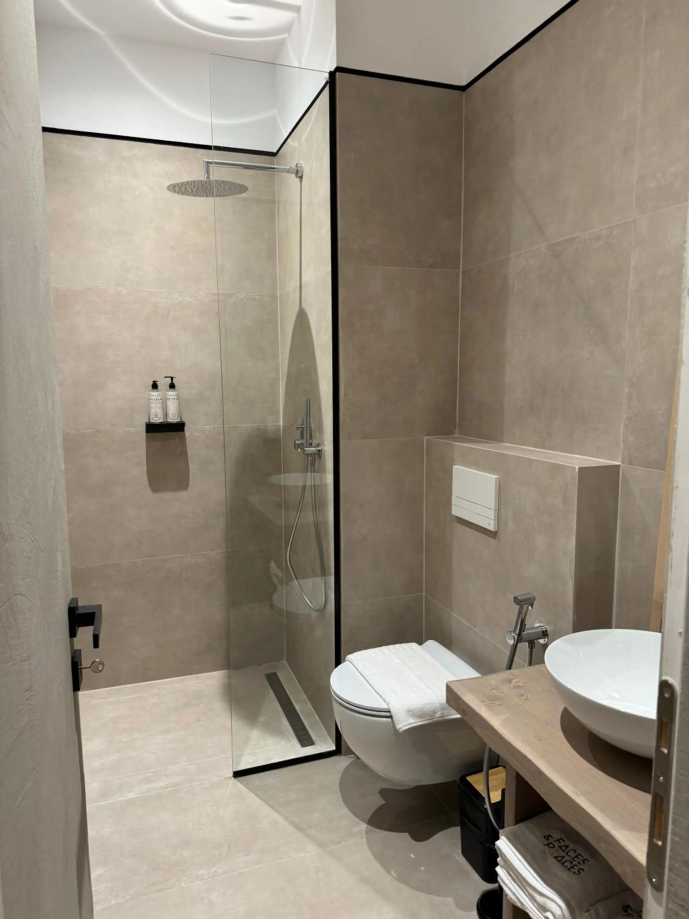 Shower in Faces & Places Boutique Hotel