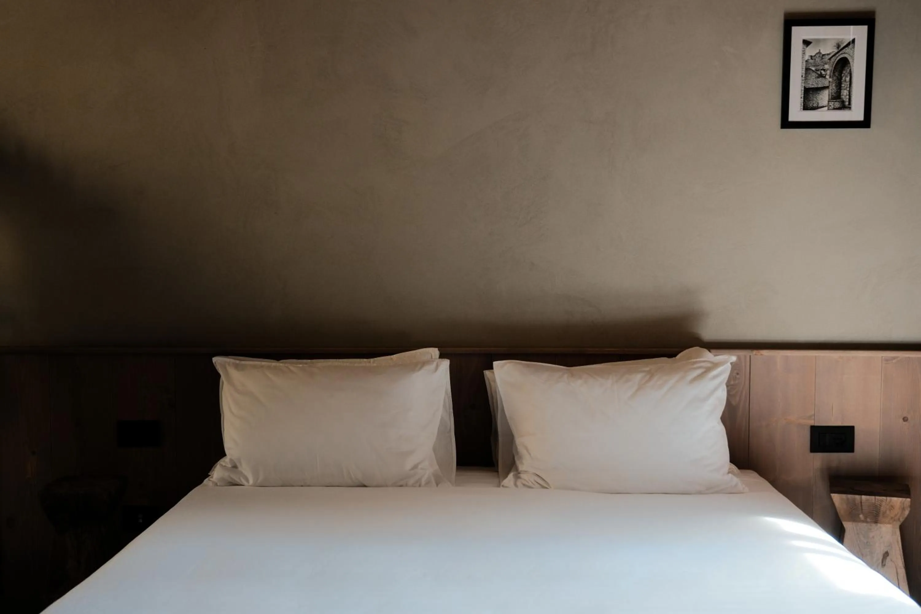 Bed in Faces & Places Boutique Hotel