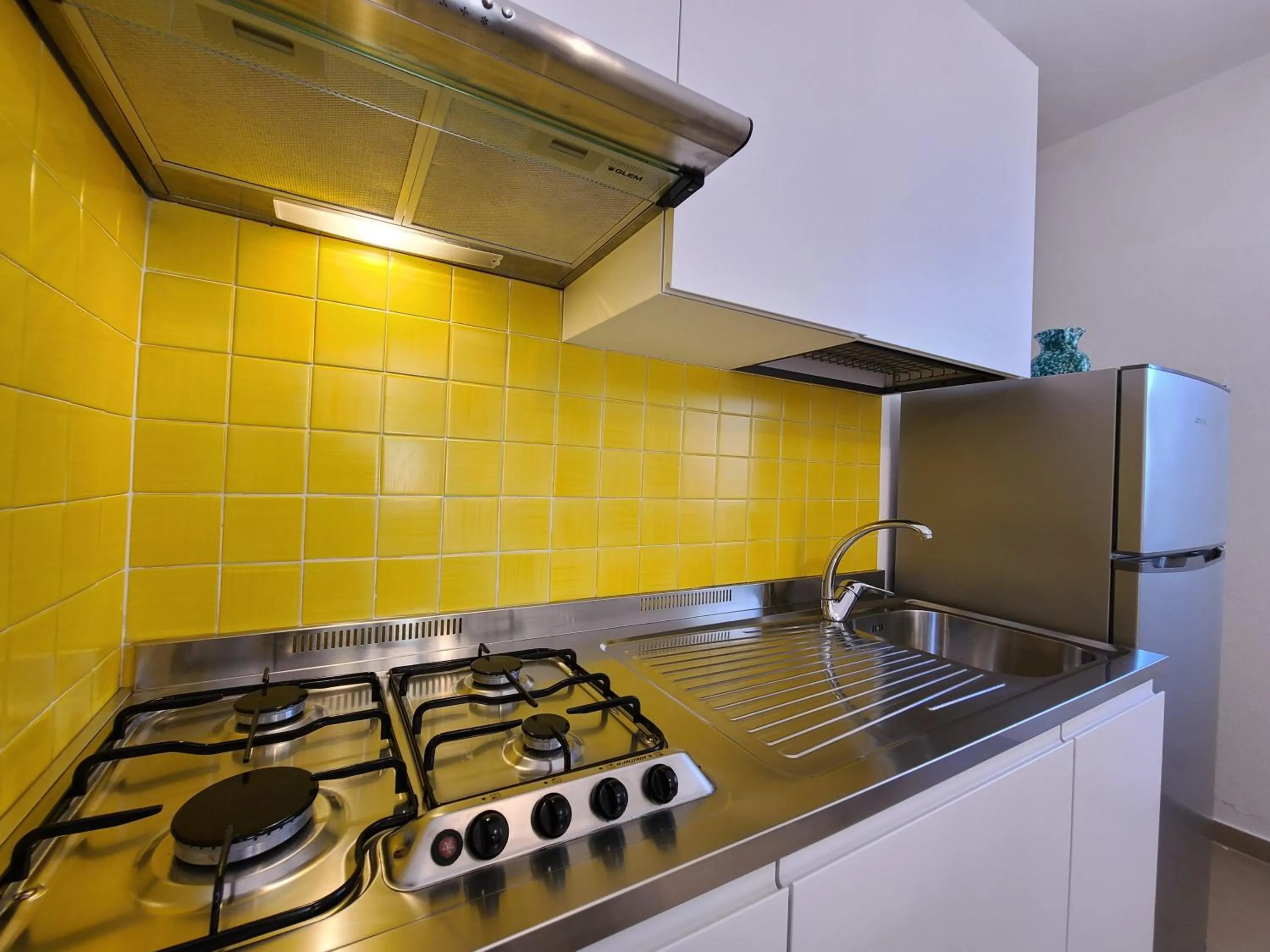 Kitchen or kitchenette in Residence Capobianco
