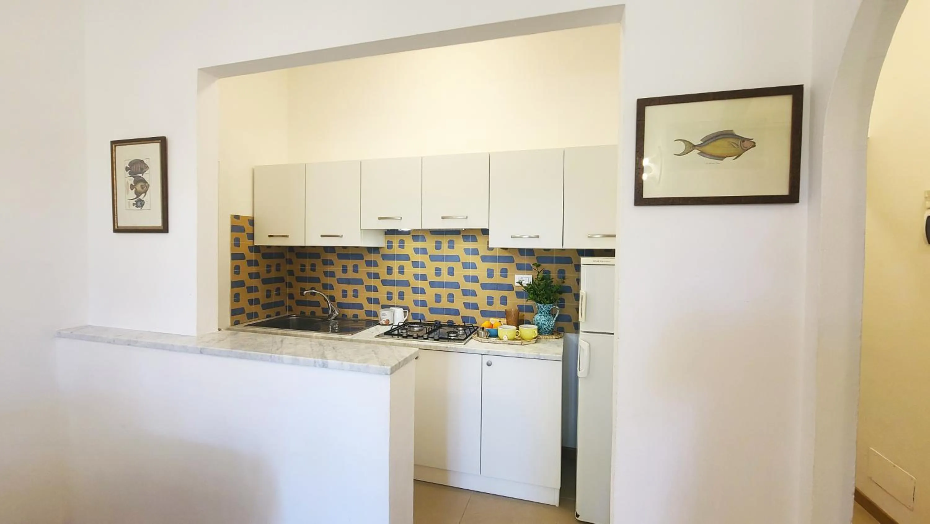 Kitchen or kitchenette in Residence Capobianco