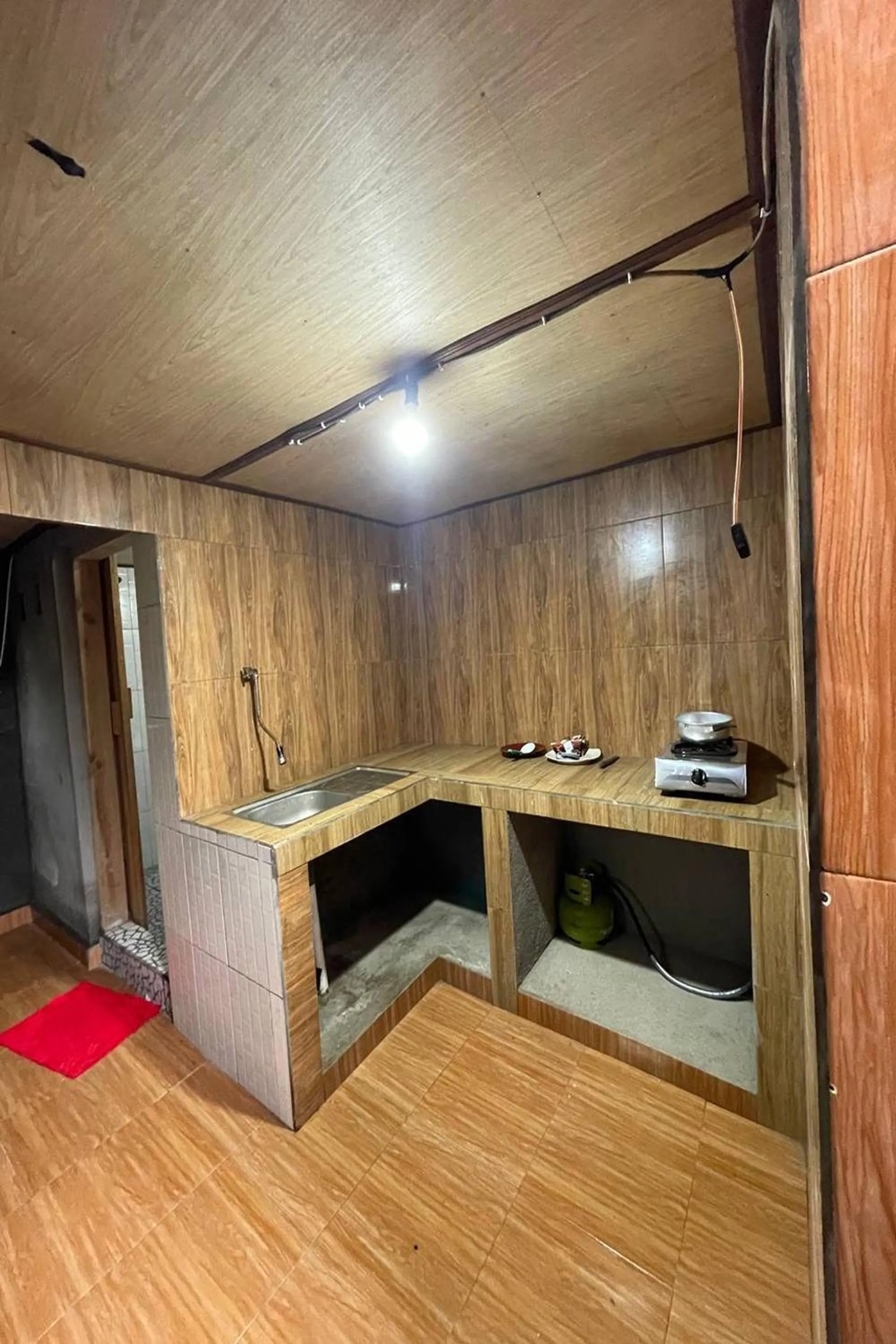 Kitchen or kitchenette in Umah Nanda Kintamani