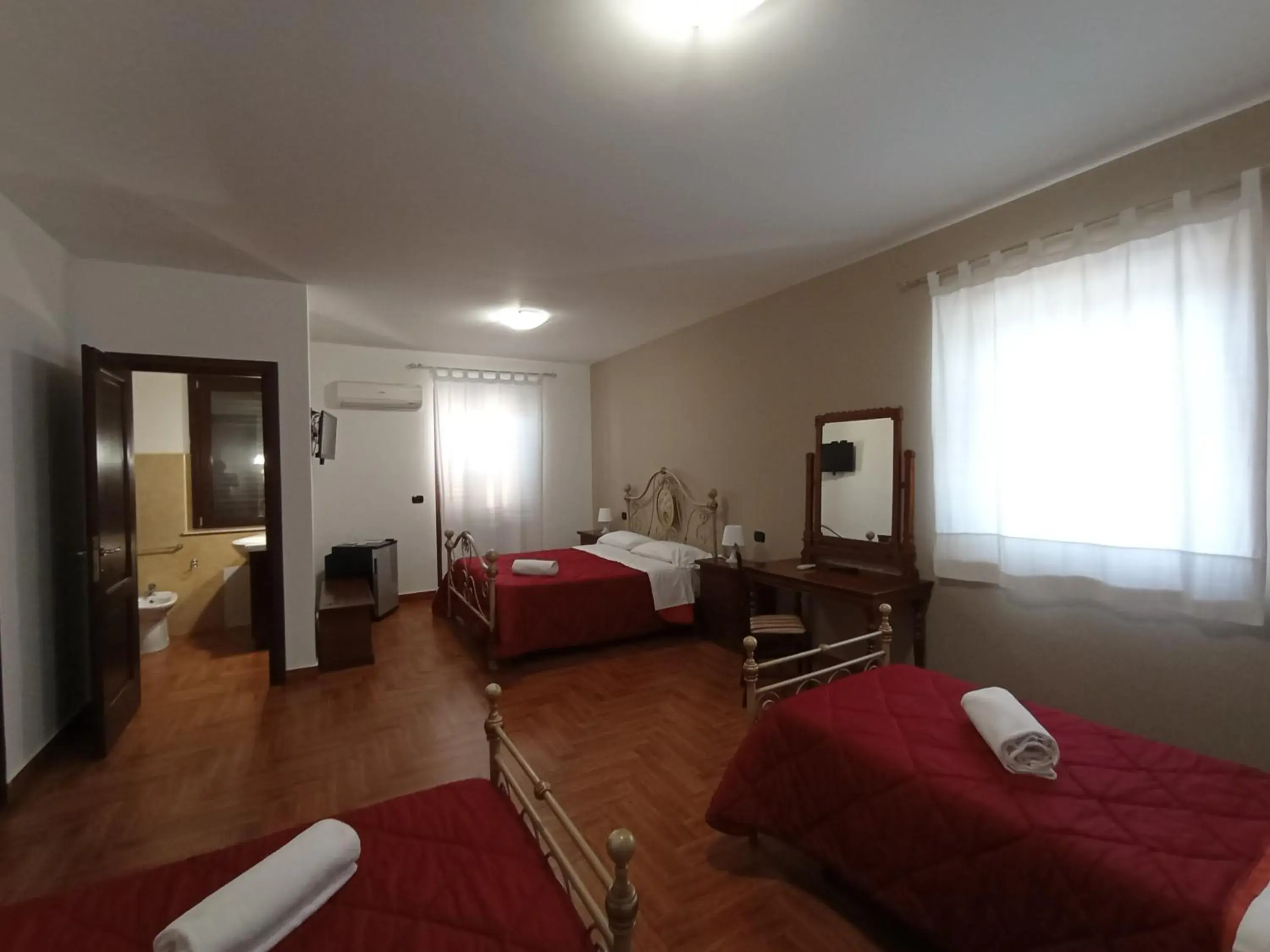 Quadruple Room with Terrace and Sea View in Città Dei Templi GuestHouse Quadruple Room with Terrace and Sea View in Città Dei Templi GuestHouse