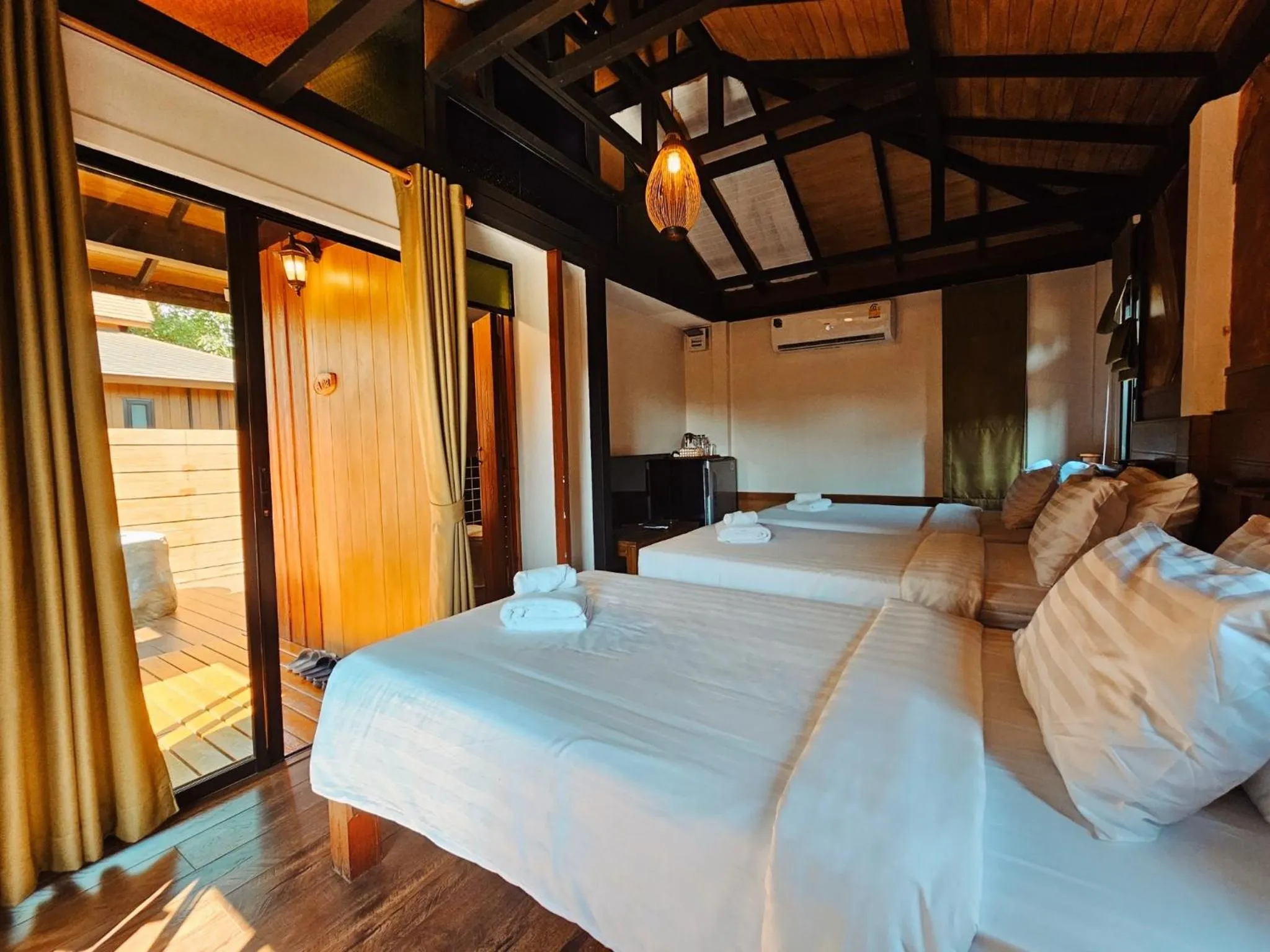 Bed in R1 Resort Rajapruek Chiangmai