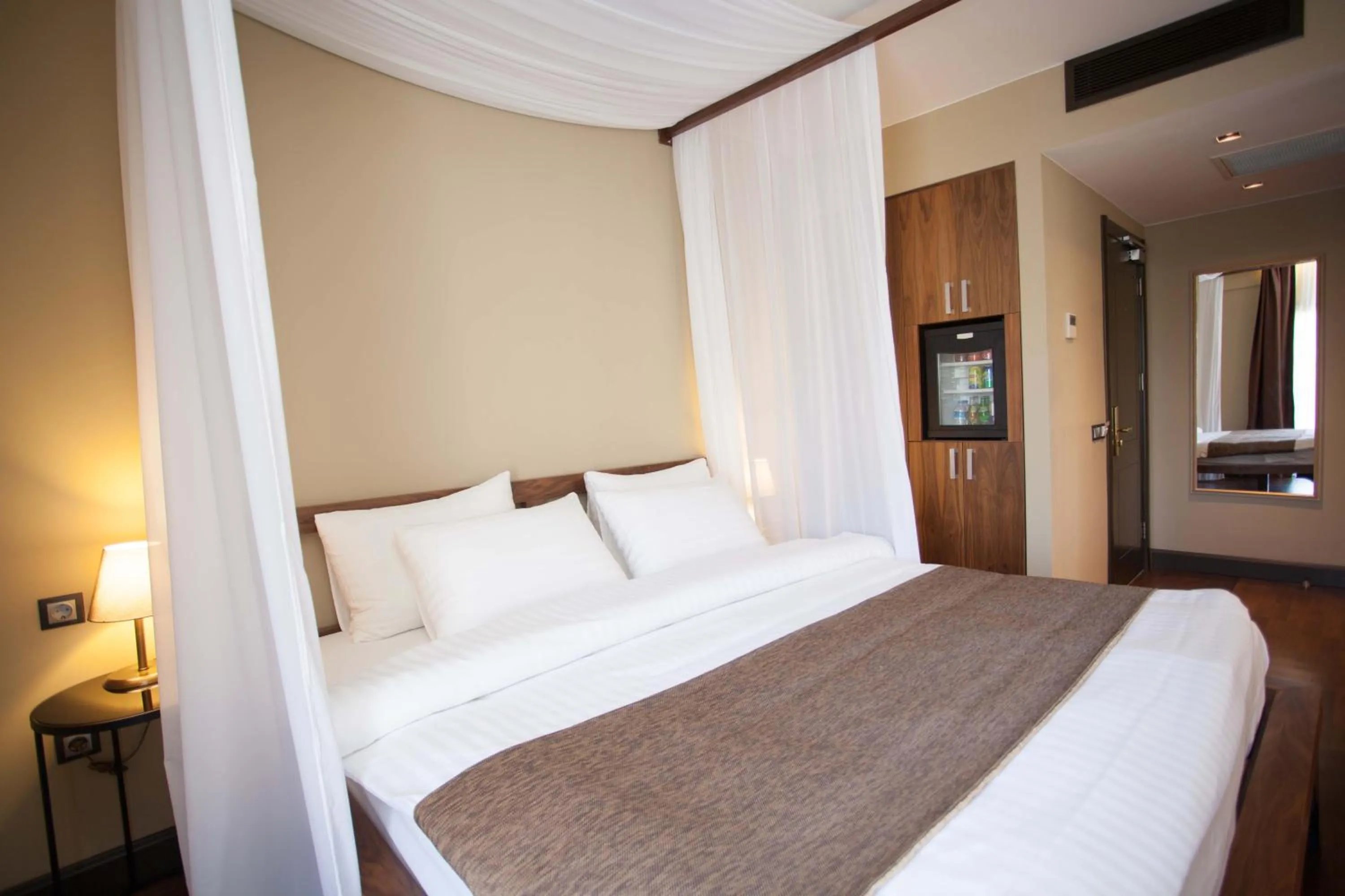 Bed in Juliet Rooms & Kitchen