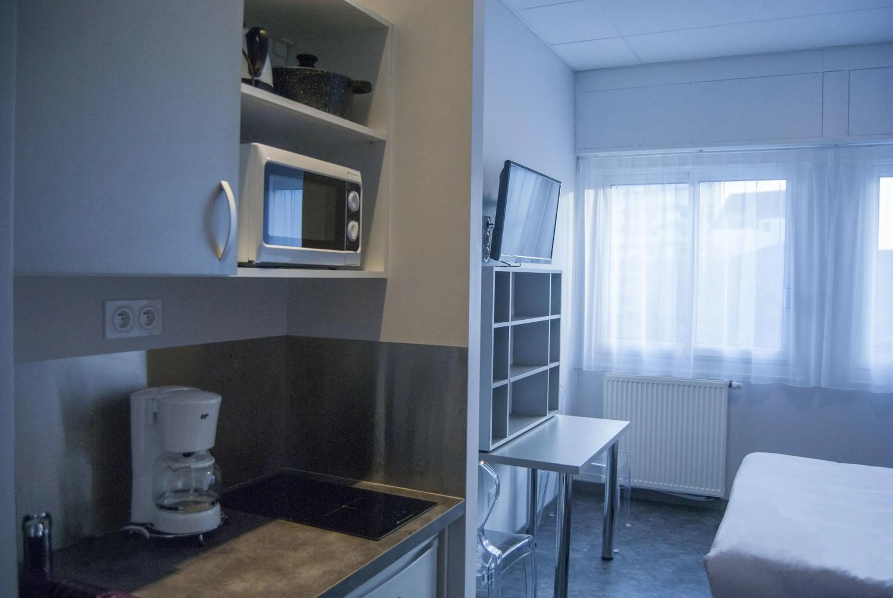 Photo of the whole room in Smartappart Lorient