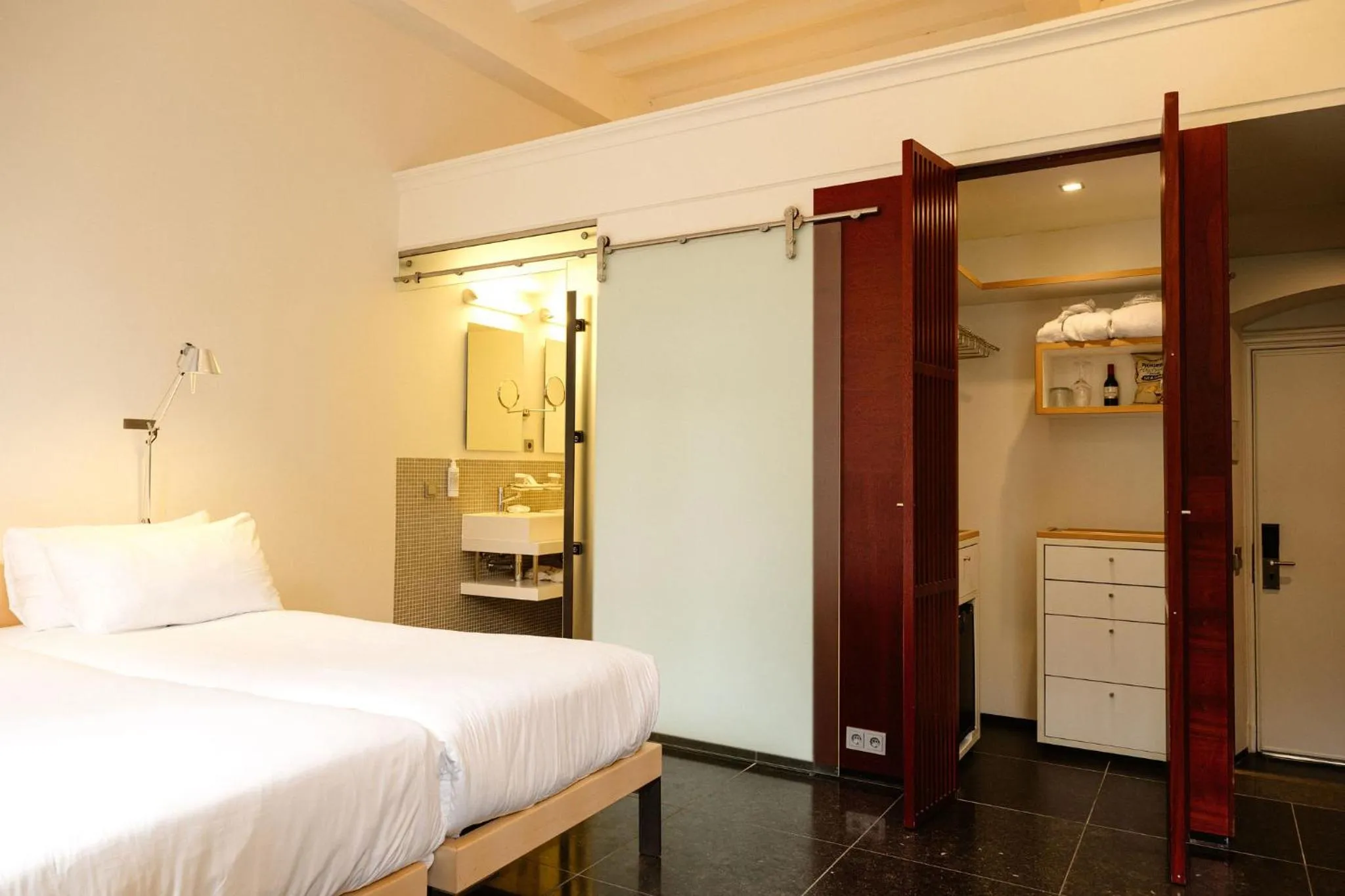 Bed in Kruisherenhotel Maastricht - Oostwegel Collection, member of Design Hotels