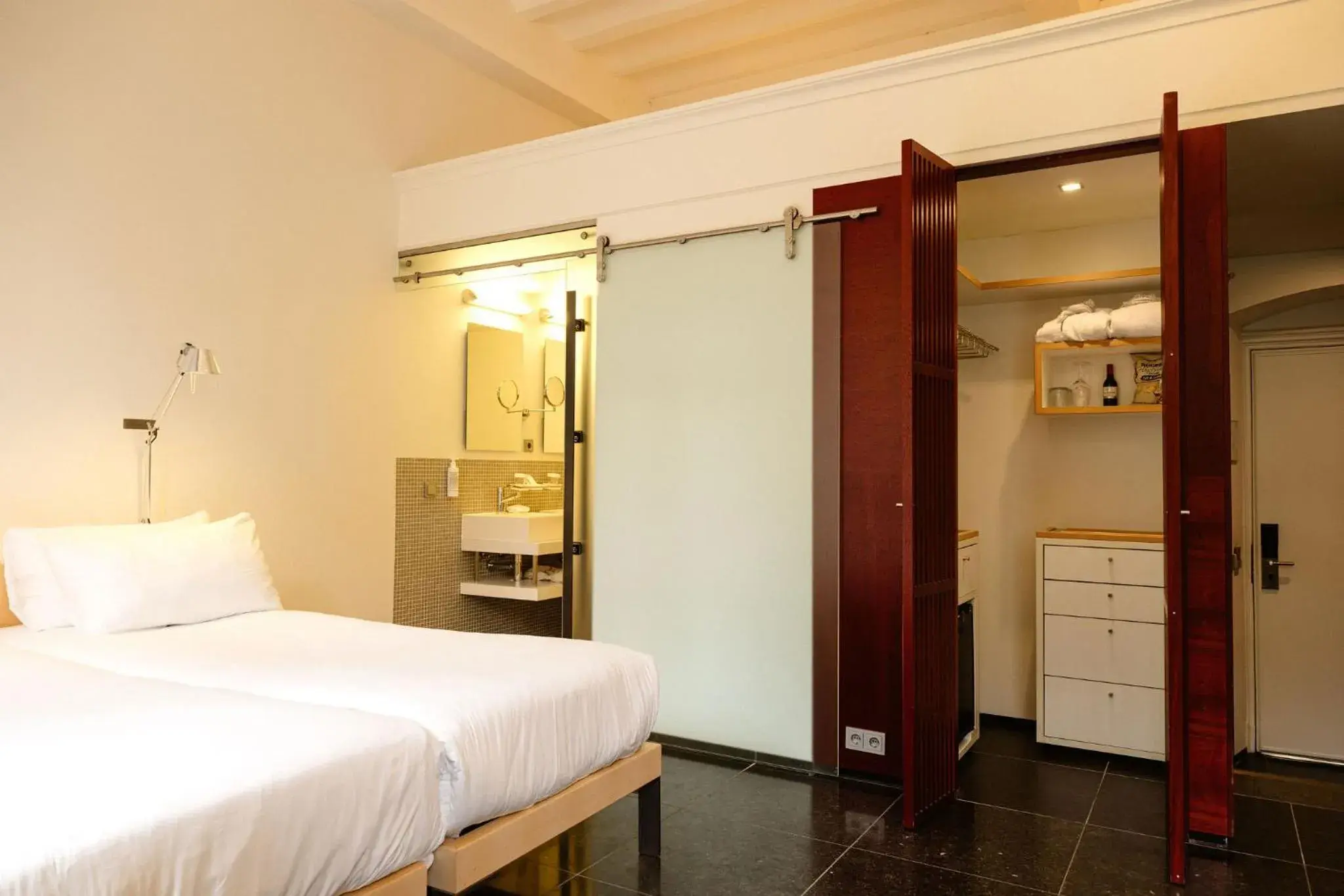 Bed in Kruisherenhotel Maastricht - Oostwegel Collection, member of Design Hotels Bed in Kruisherenhotel Maastricht - Oostwegel Collection, member of Design Hotels