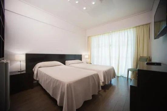 Bed in Hotel Versailles