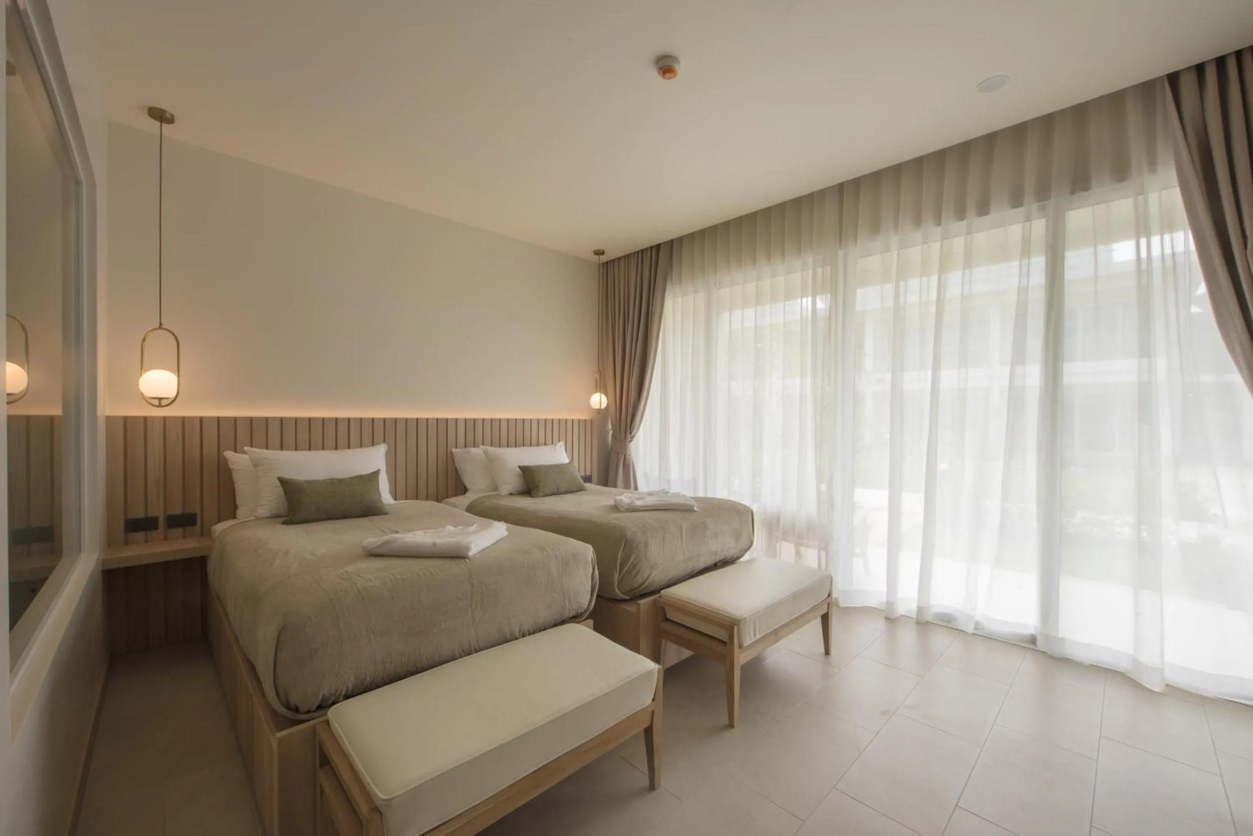 Bed in Niranapa Boutique Resort