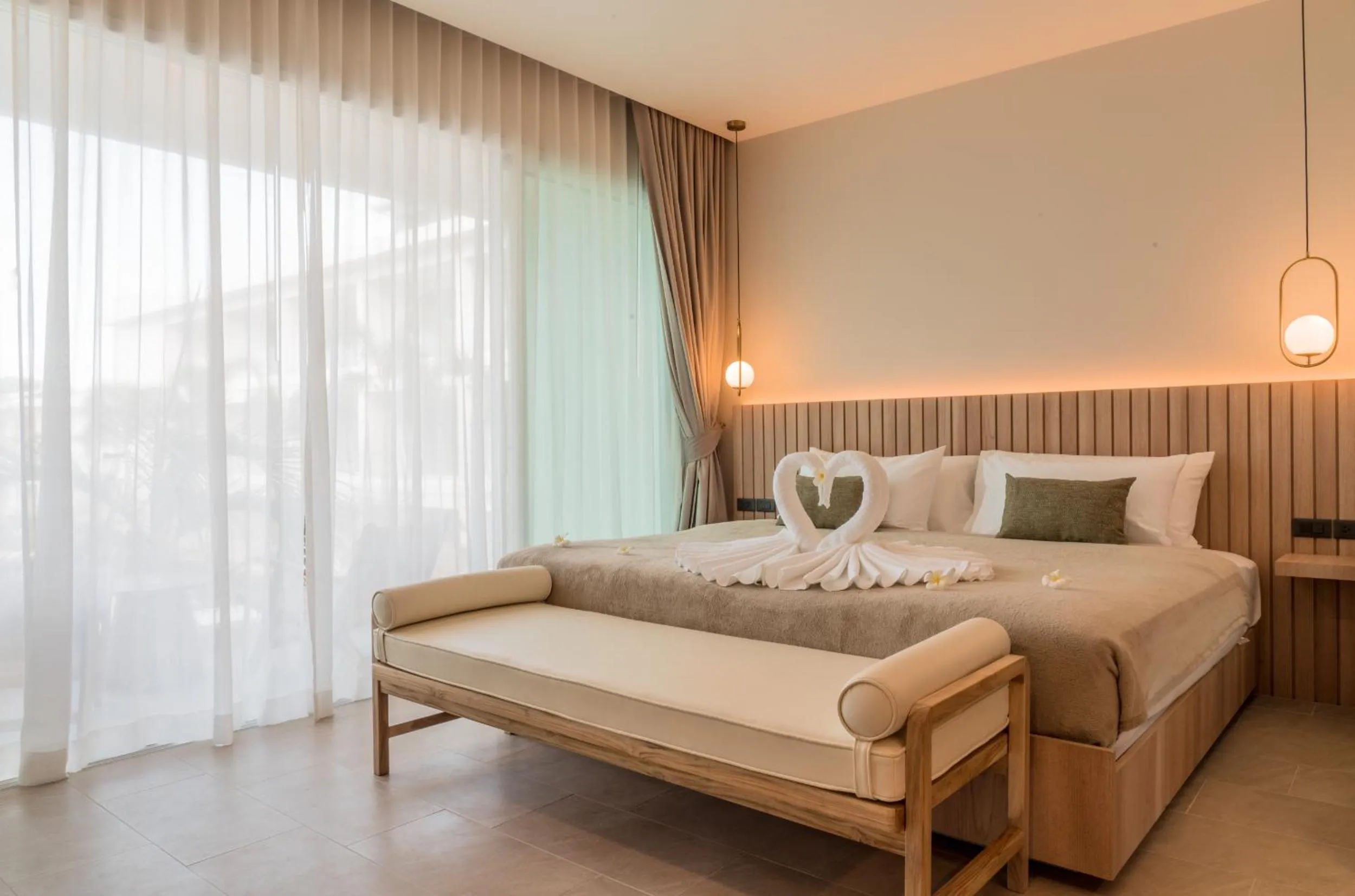 Bed in Niranapa Boutique Resort