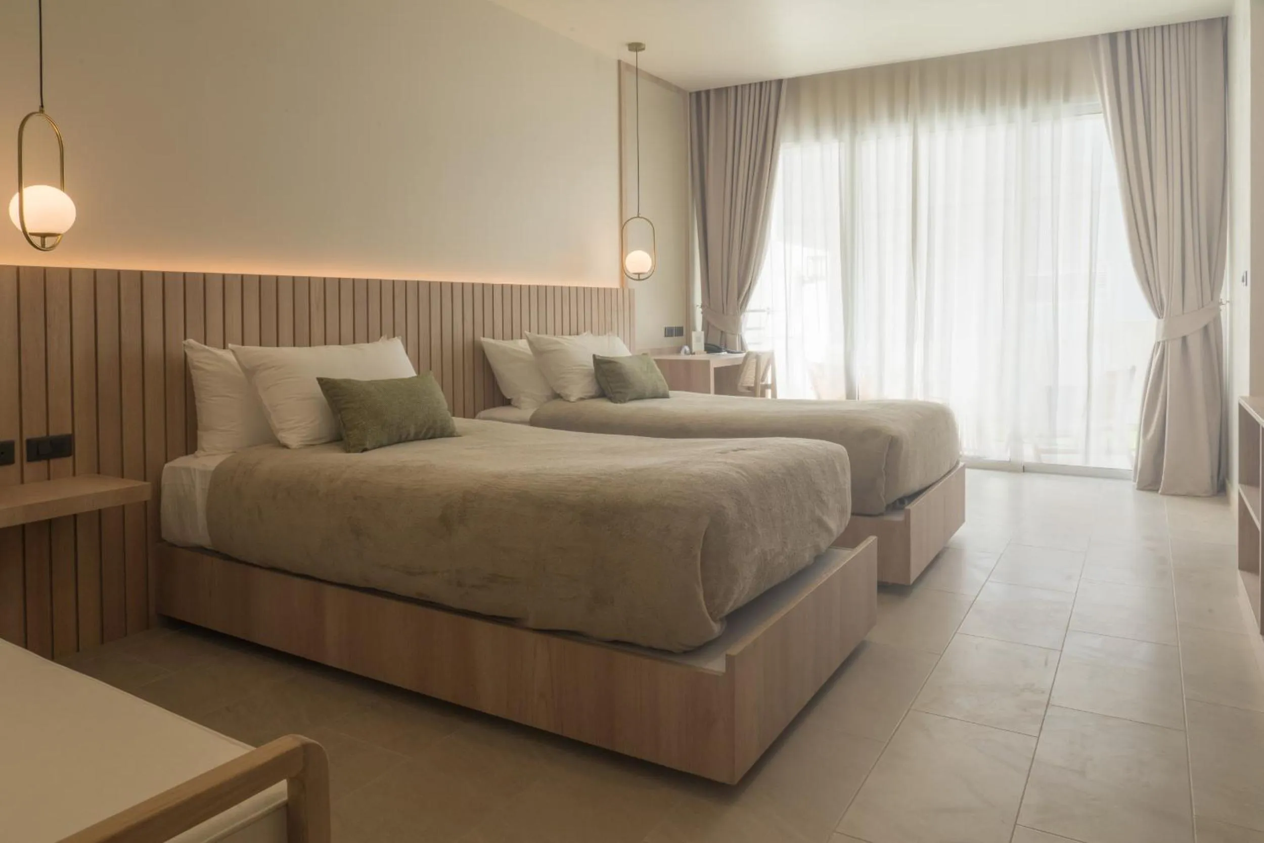 Bed in Niranapa Boutique Resort