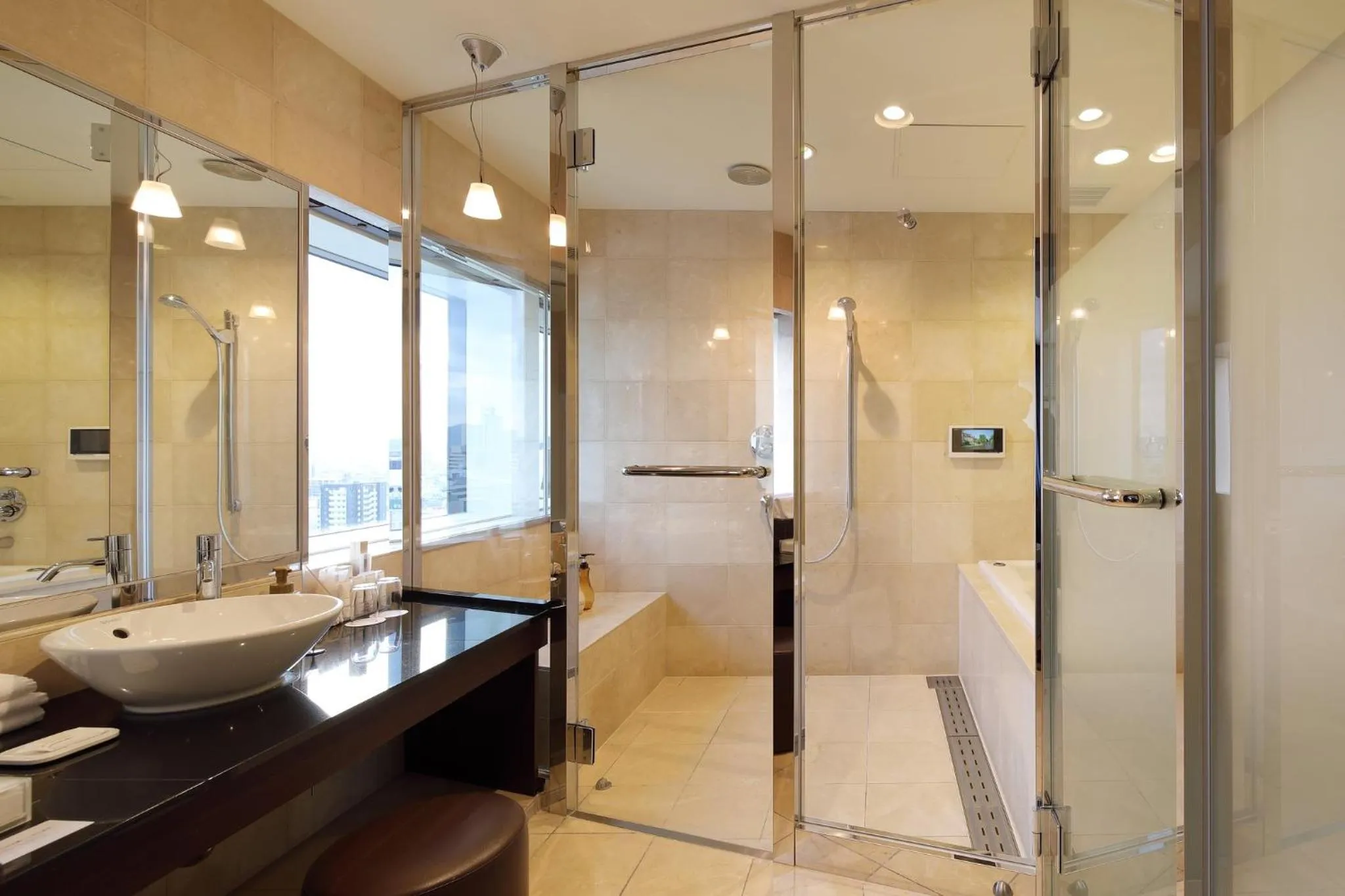 Bathroom in ANA Crowne Plaza Okayama by IHG