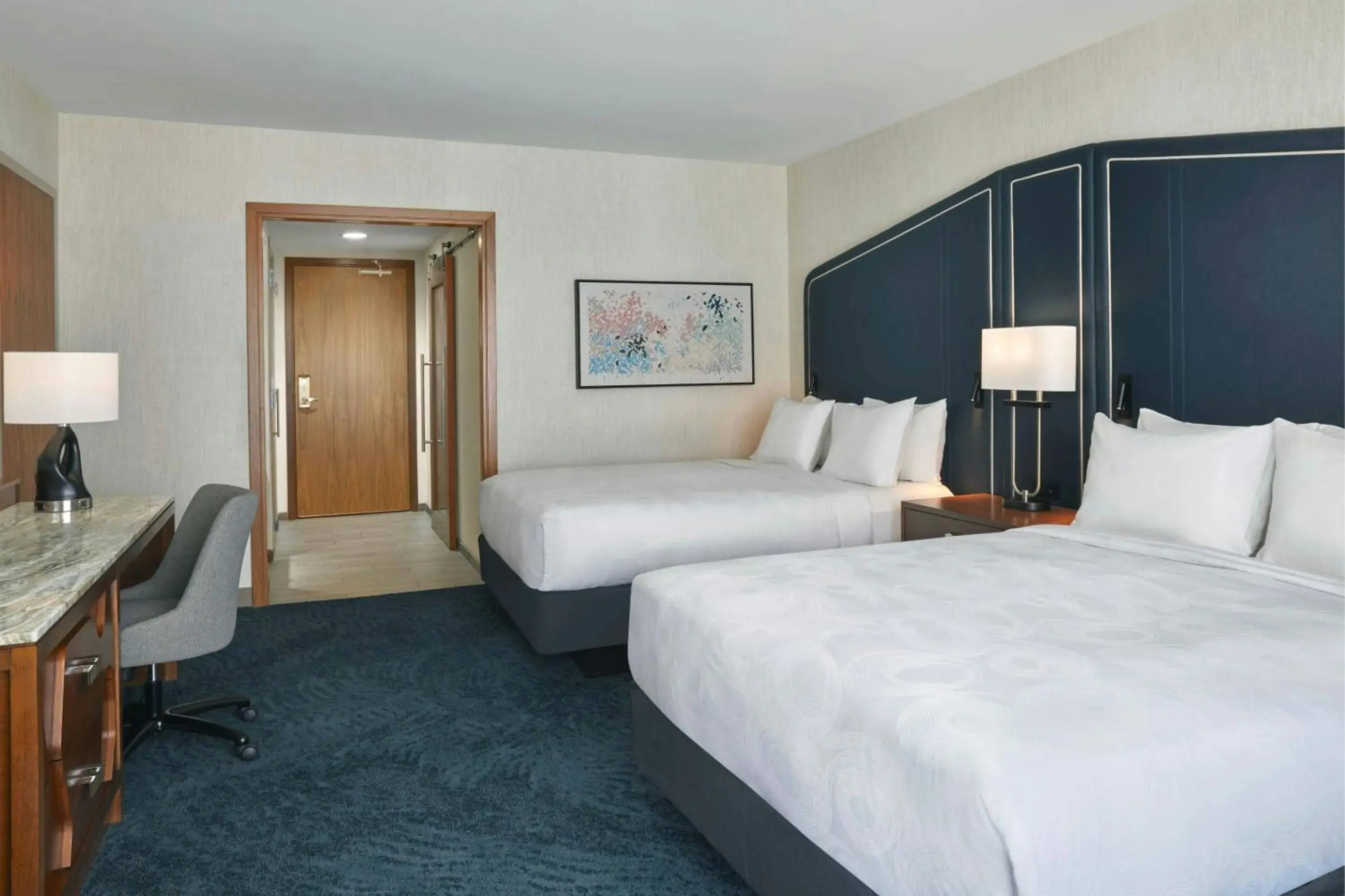 Queen Guest Room with Two Queen Beds and Skyline View in JW Marriott Austin Queen Guest Room with Two Queen Beds and Skyline View in JW Marriott Austin