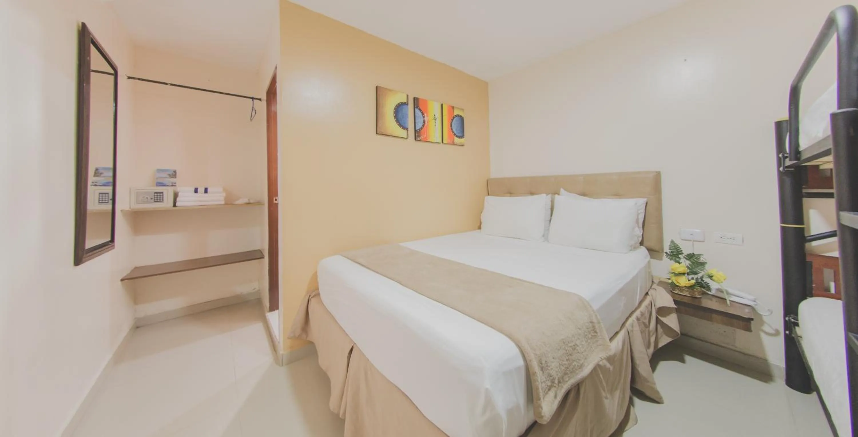 Photo of the whole room, Bed in Azuán Suites Hotel By GEH Suites