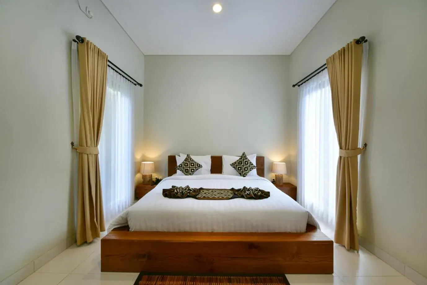 Bed in Mahayoga Ubud Private Pool Villa Spa And Resto Bed in Mahayoga Ubud Private Pool Villa Spa And Resto