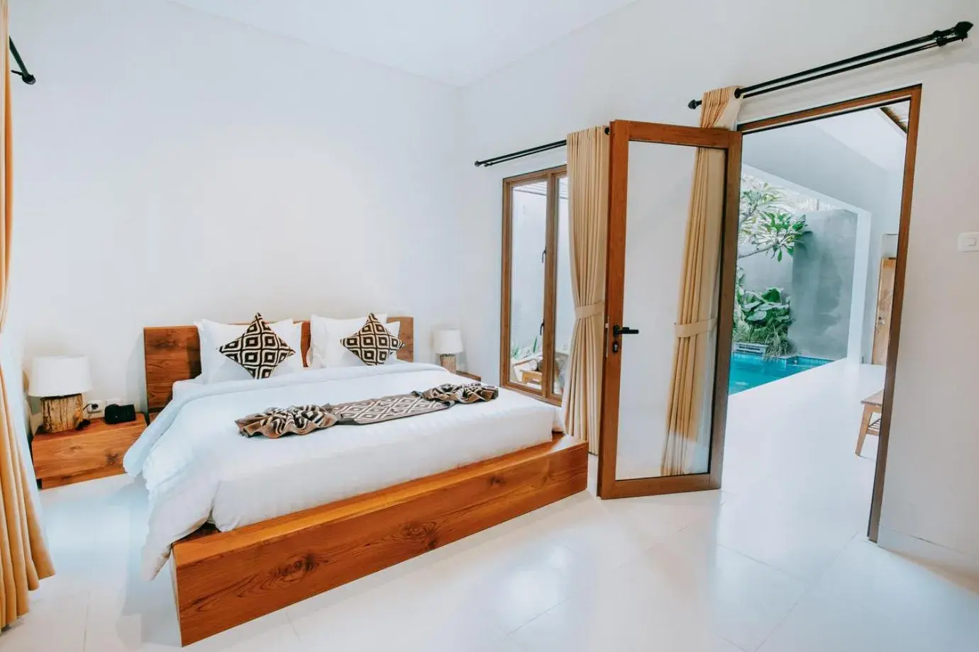 Bed in Mahayoga Ubud Private Pool Villa Spa And Resto Bed in Mahayoga Ubud Private Pool Villa Spa And Resto