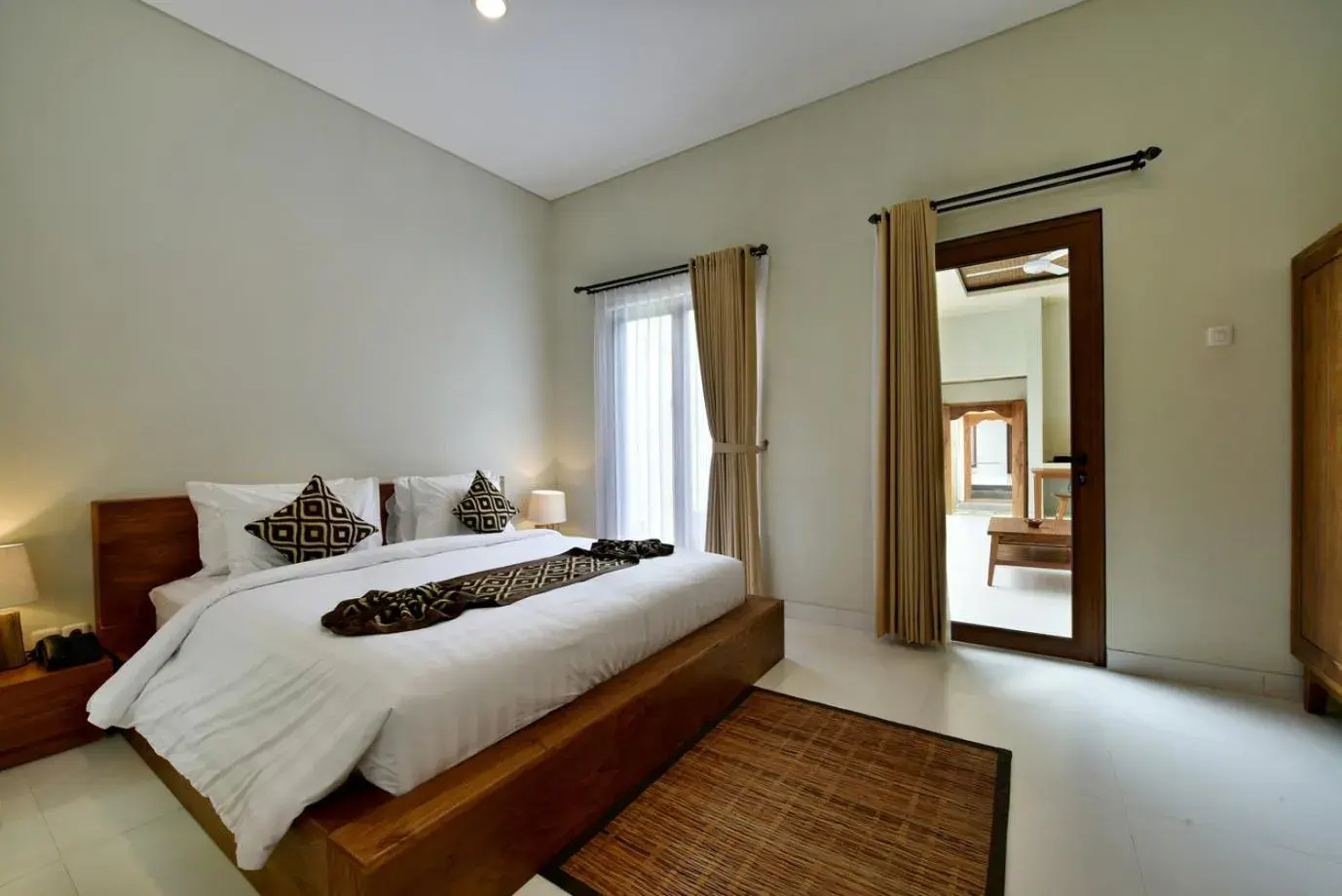 Bed in Mahayoga Ubud Private Pool Villa Spa And Resto Bed in Mahayoga Ubud Private Pool Villa Spa And Resto