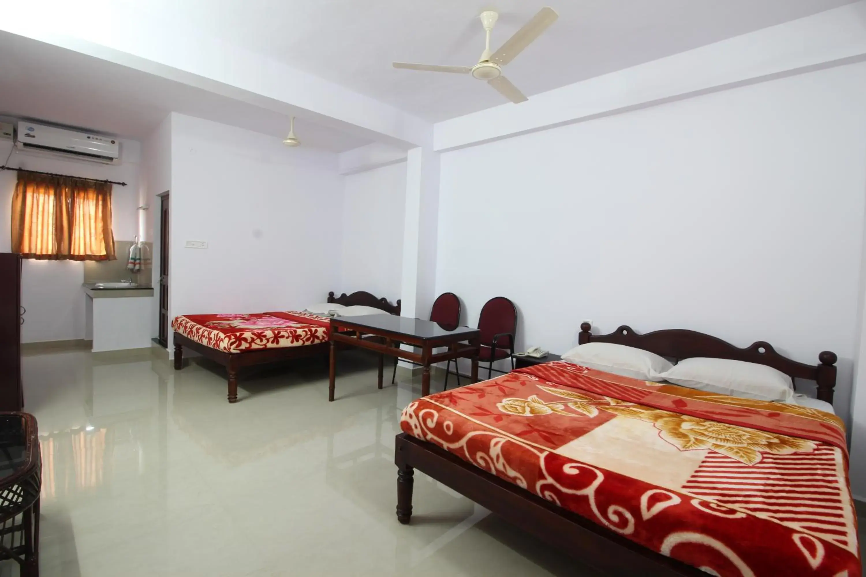 Bedroom, Bed in Dubai Hotel & Restaurant Kumarakom Bedroom, Bed in Dubai Hotel & Restaurant Kumarakom