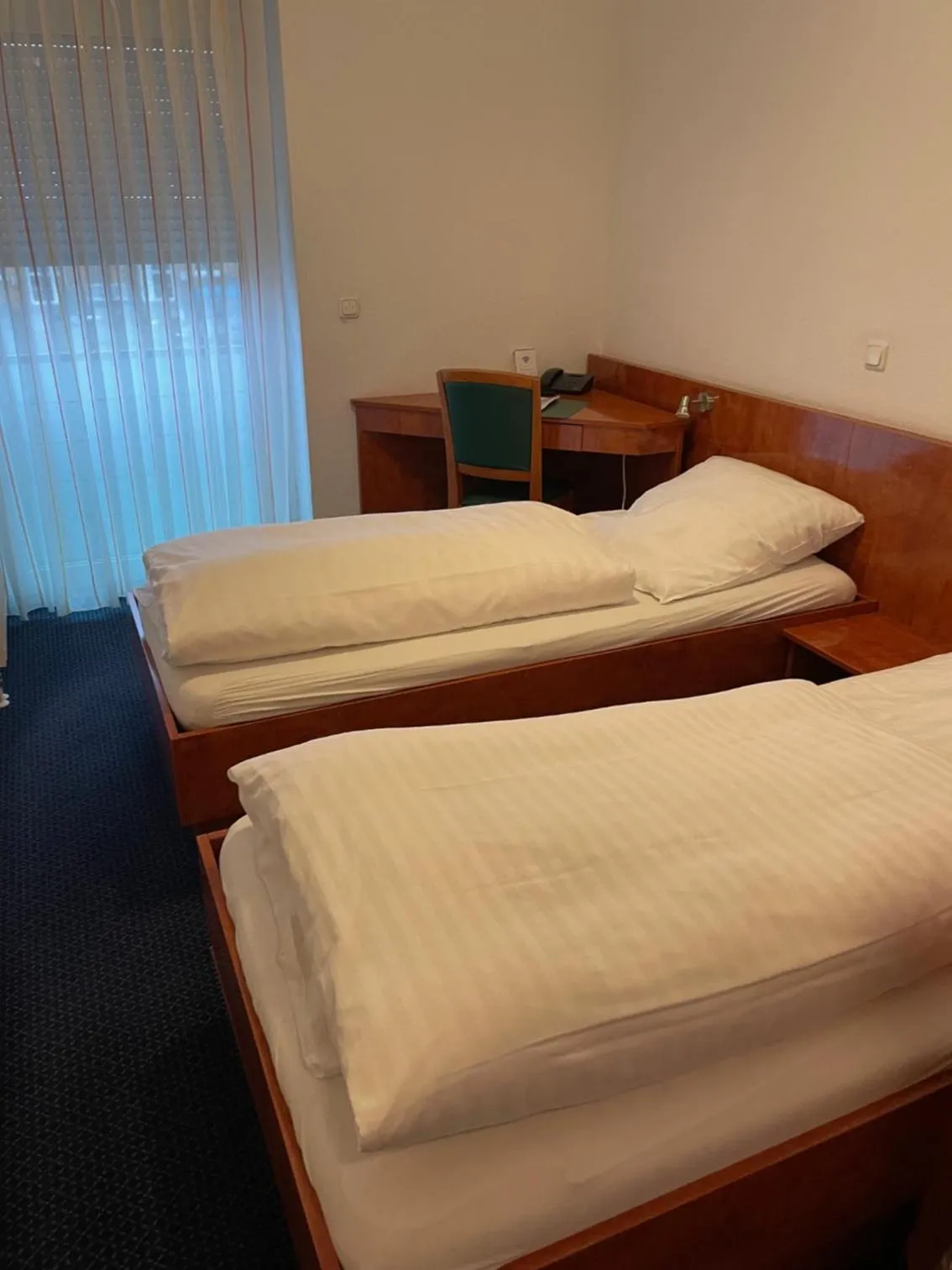 Bed in Hotel Merkenich