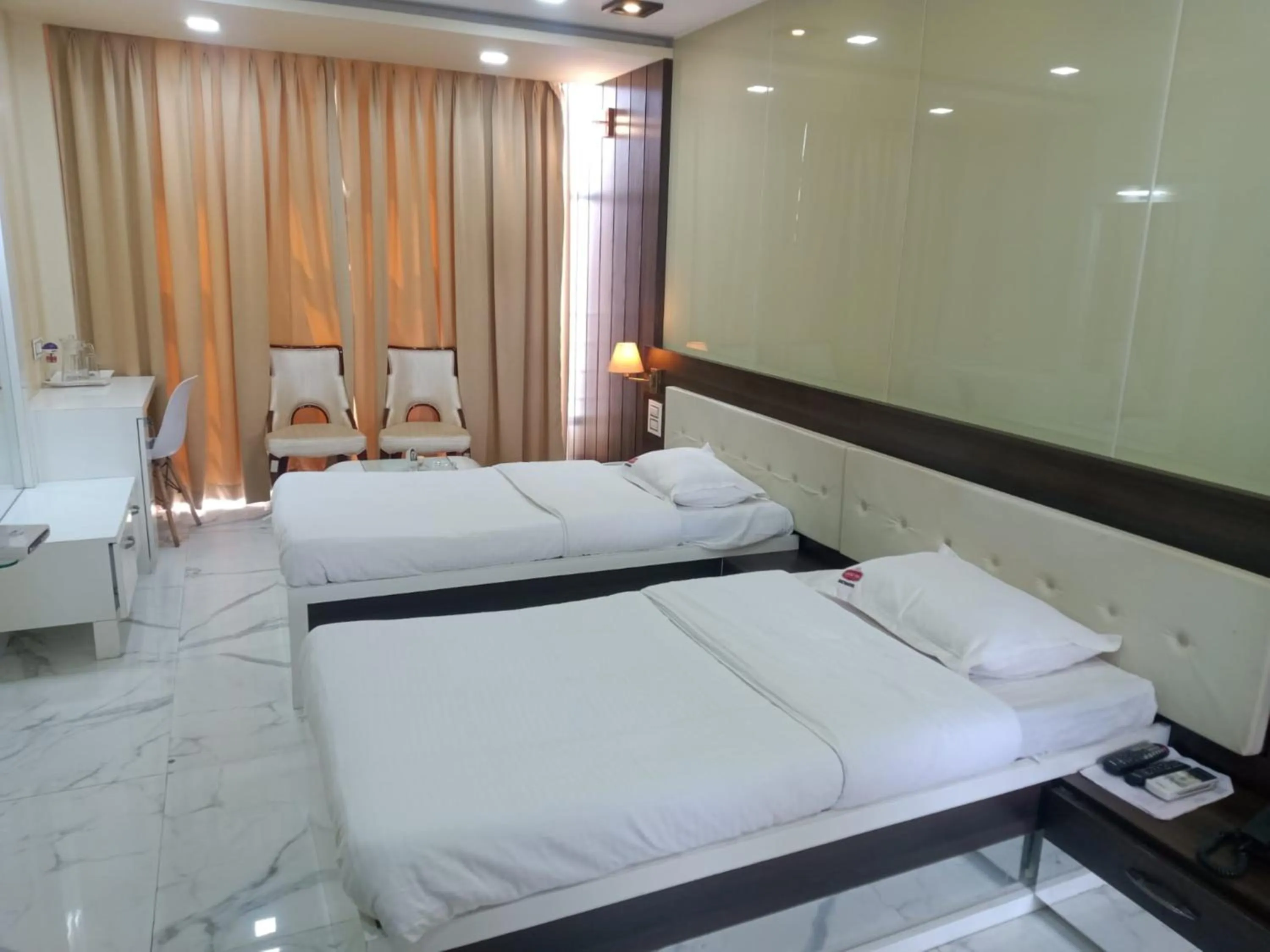 Bed in VITS Select Grand Inn, Ratnagiri