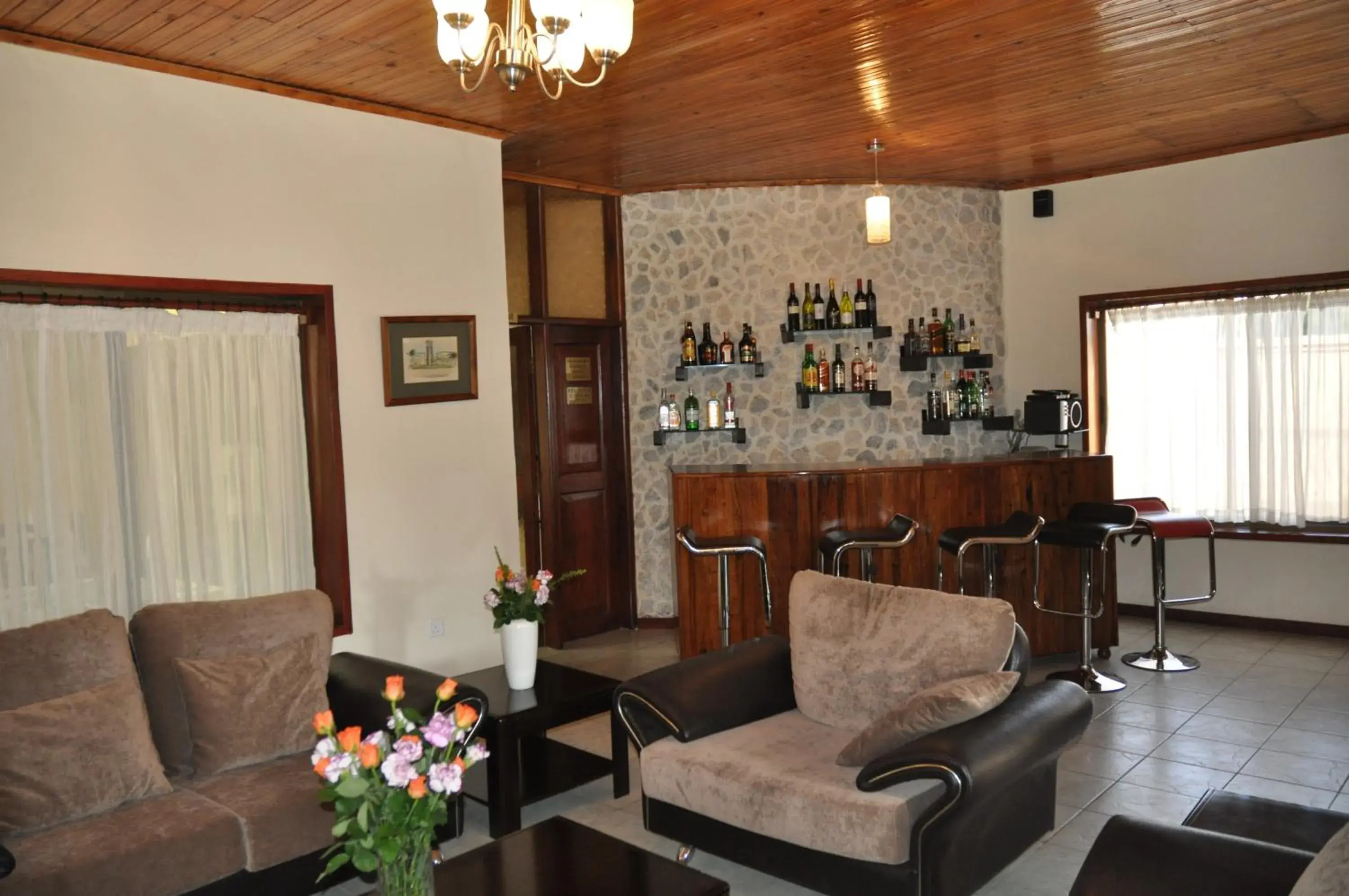 Lounge or bar in The Milimani Lodge Lounge or bar in The Milimani Lodge