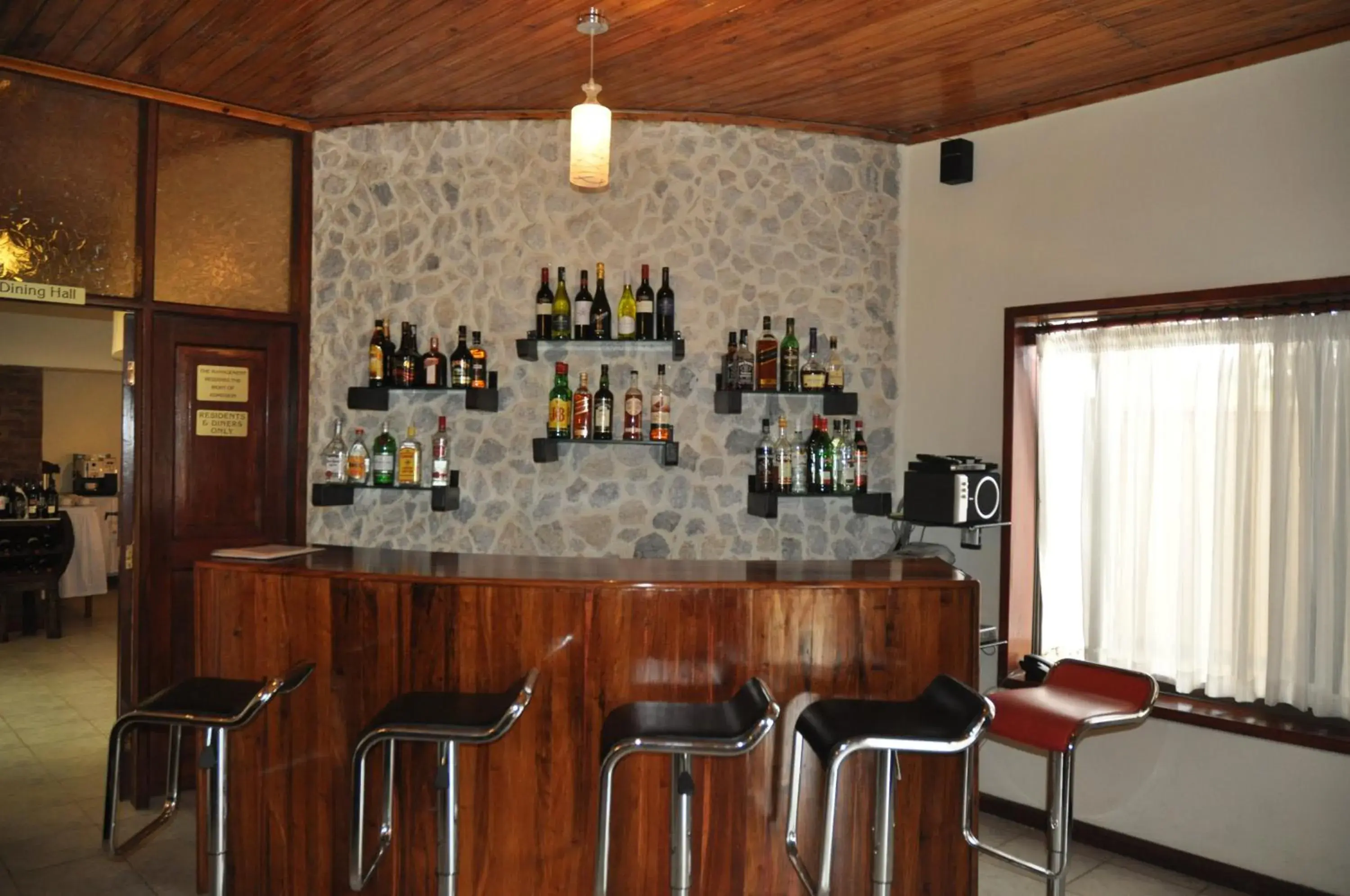 Lounge or bar in The Milimani Lodge Lounge or bar in The Milimani Lodge