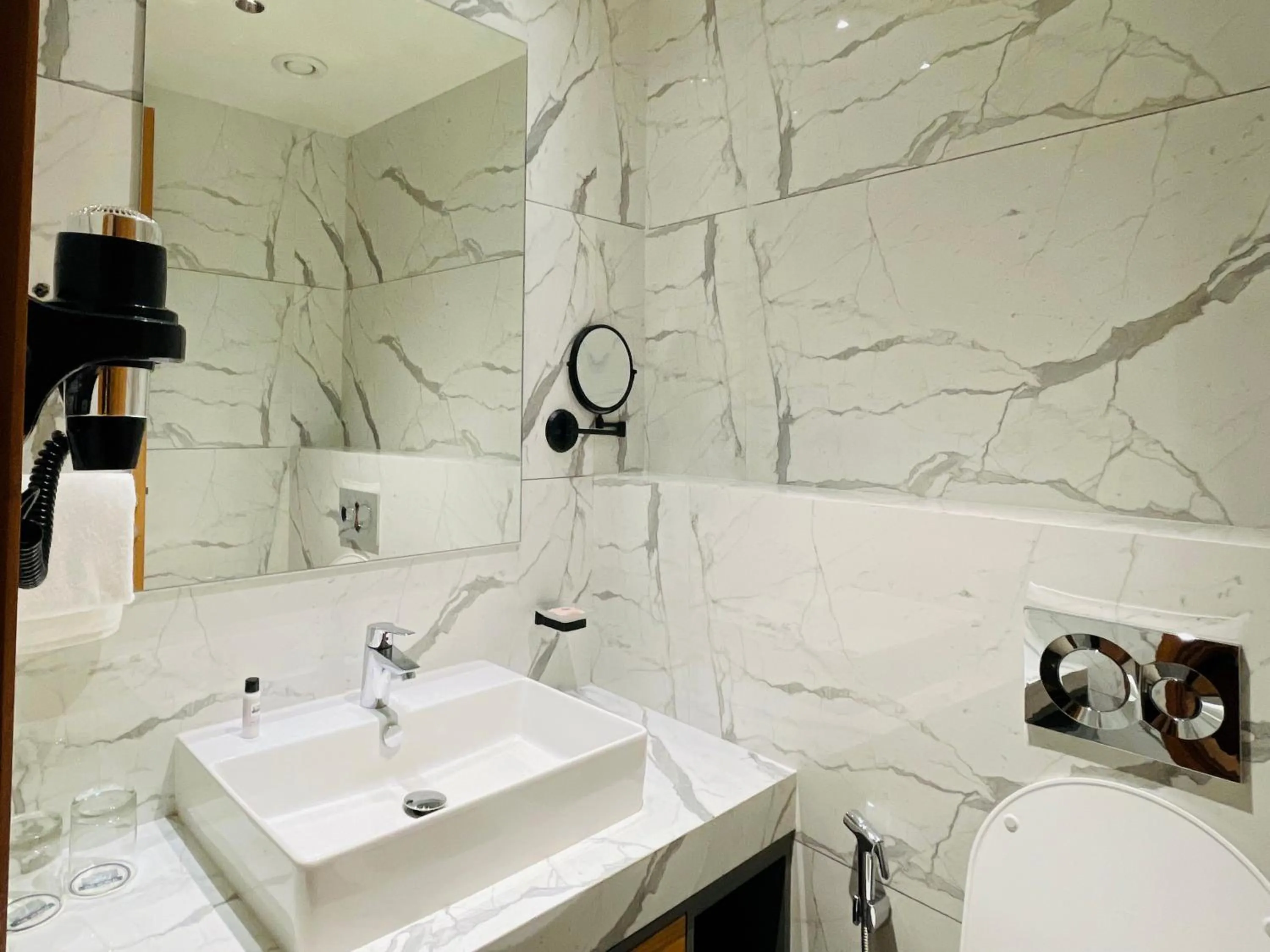 Bathroom in Regenta - The World Surat