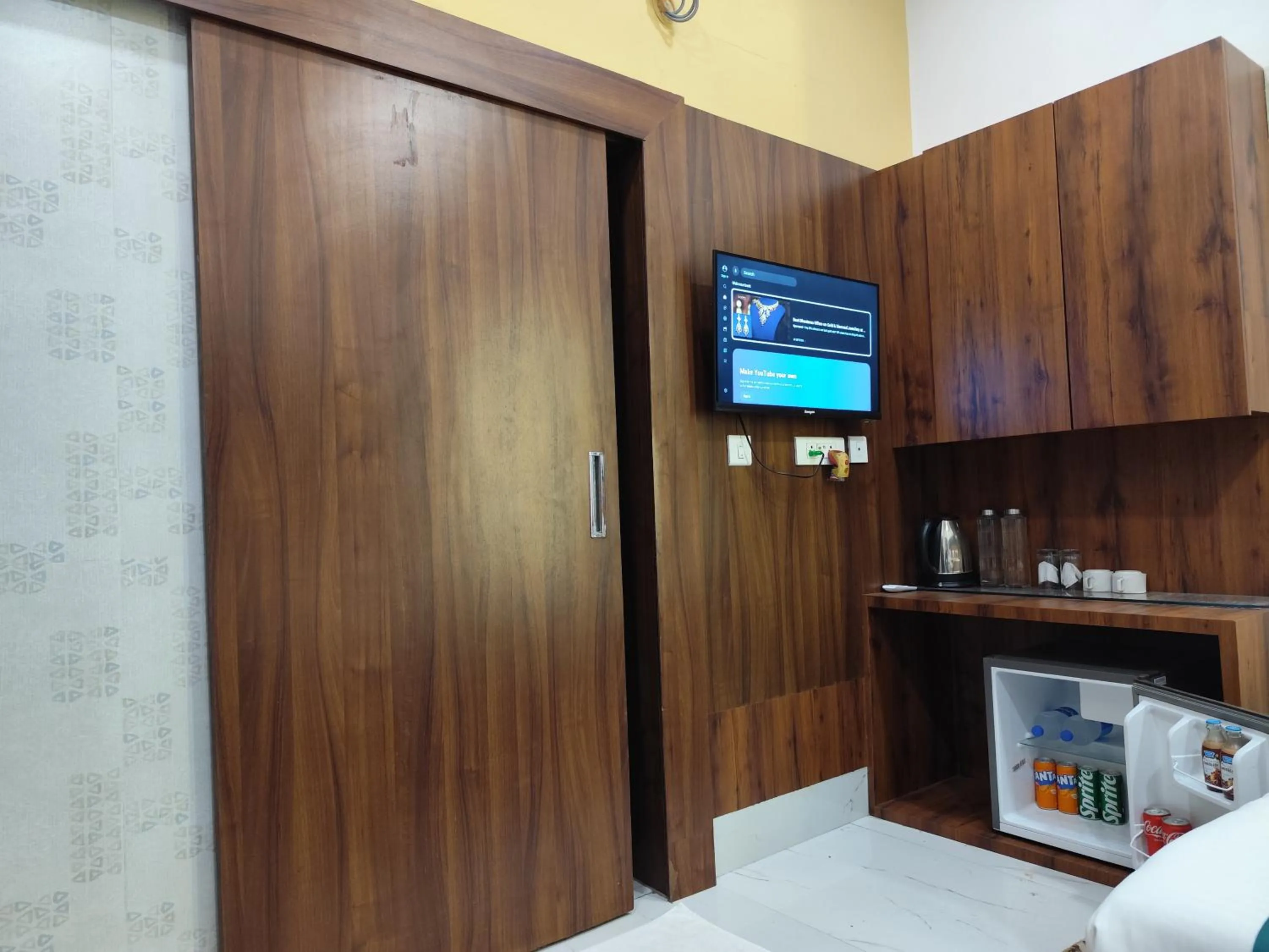 TV and multimedia in The Vacation Villa Agra A Boutique Hotel Near Taj Mahal