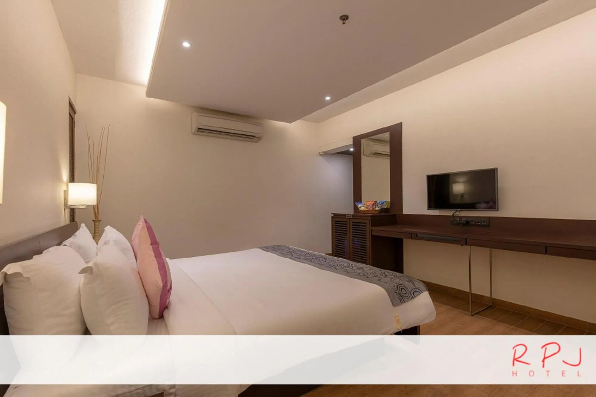 Bed in RPJ Hotel Rajkot