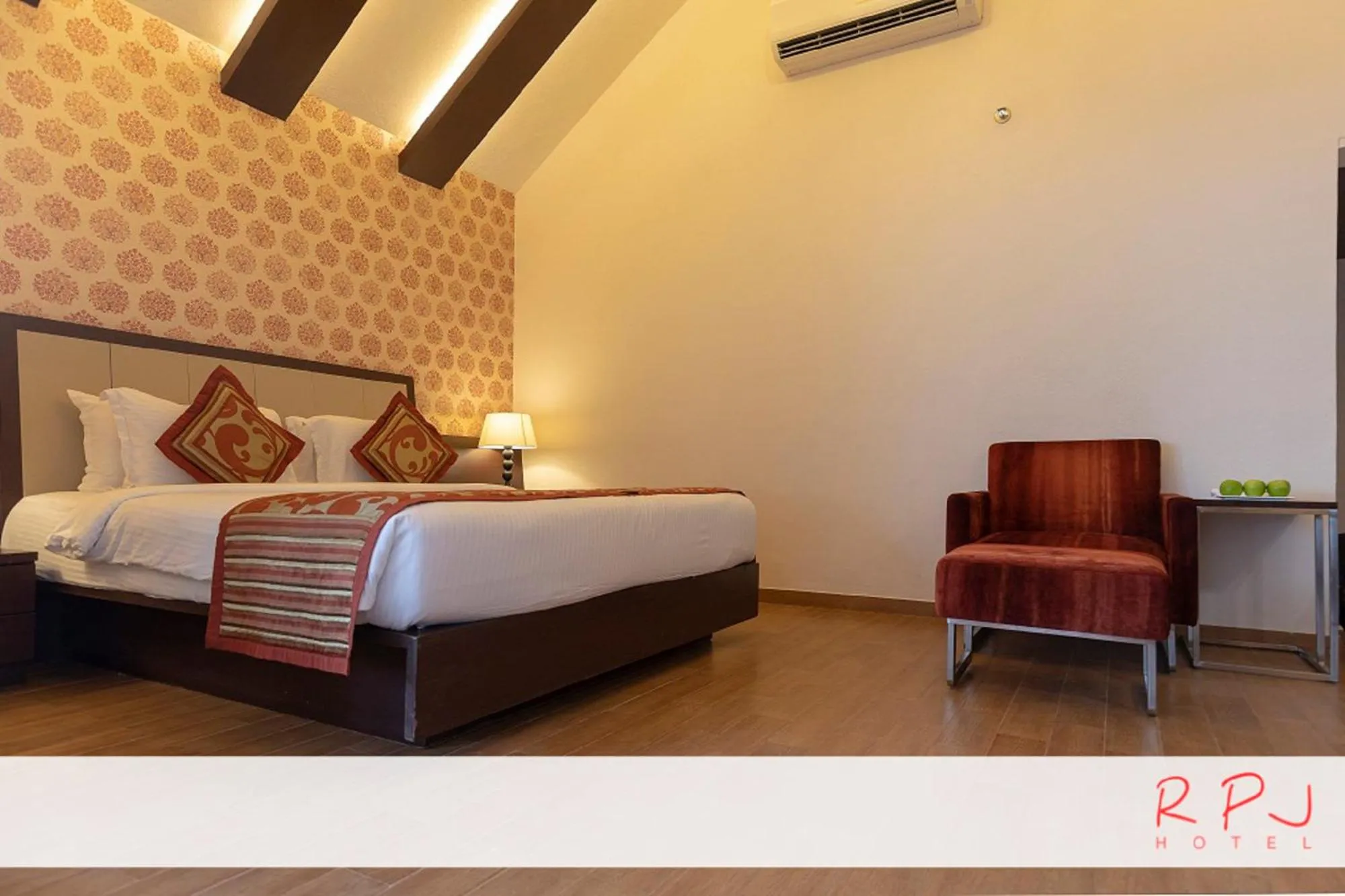 Photo of the whole room, Bed in RPJ Hotel Rajkot