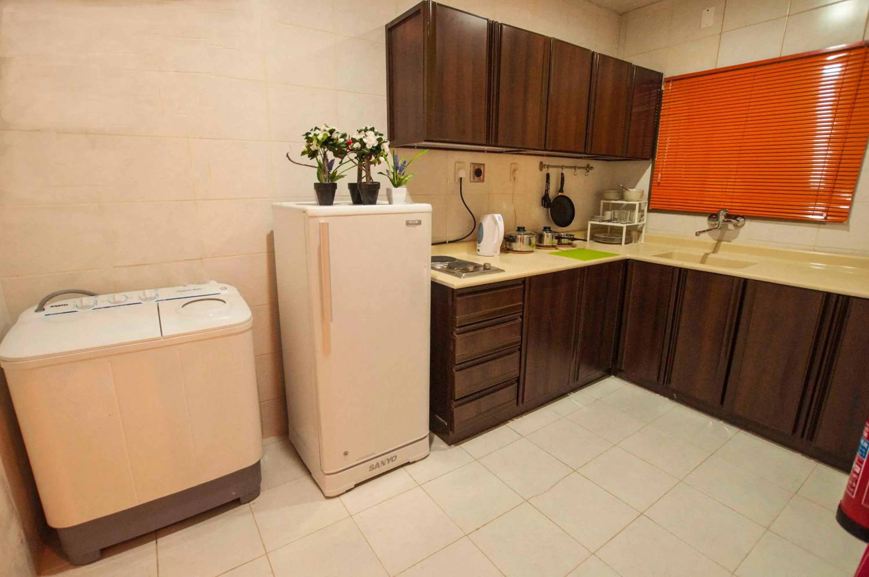 Kitchen or kitchenette in City Suites