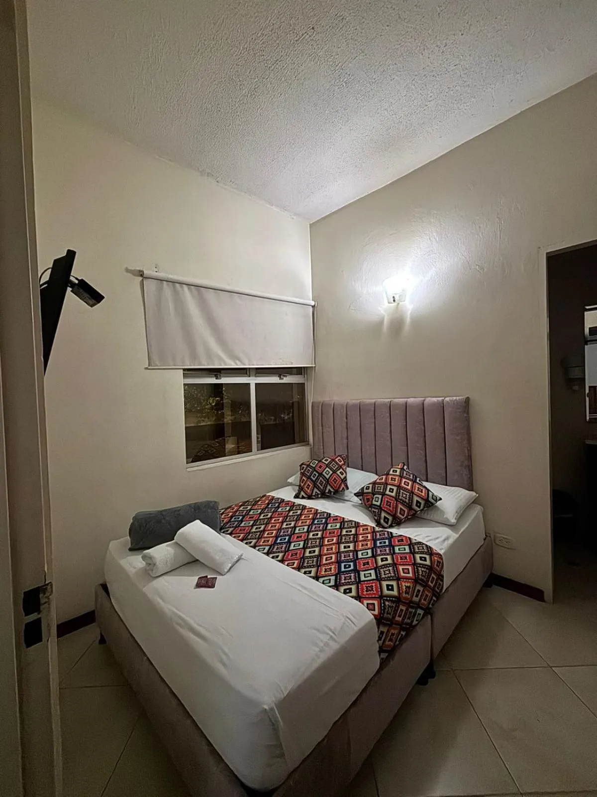 Bed in Hotel Tierra Santa Santa Fe de Antioquia