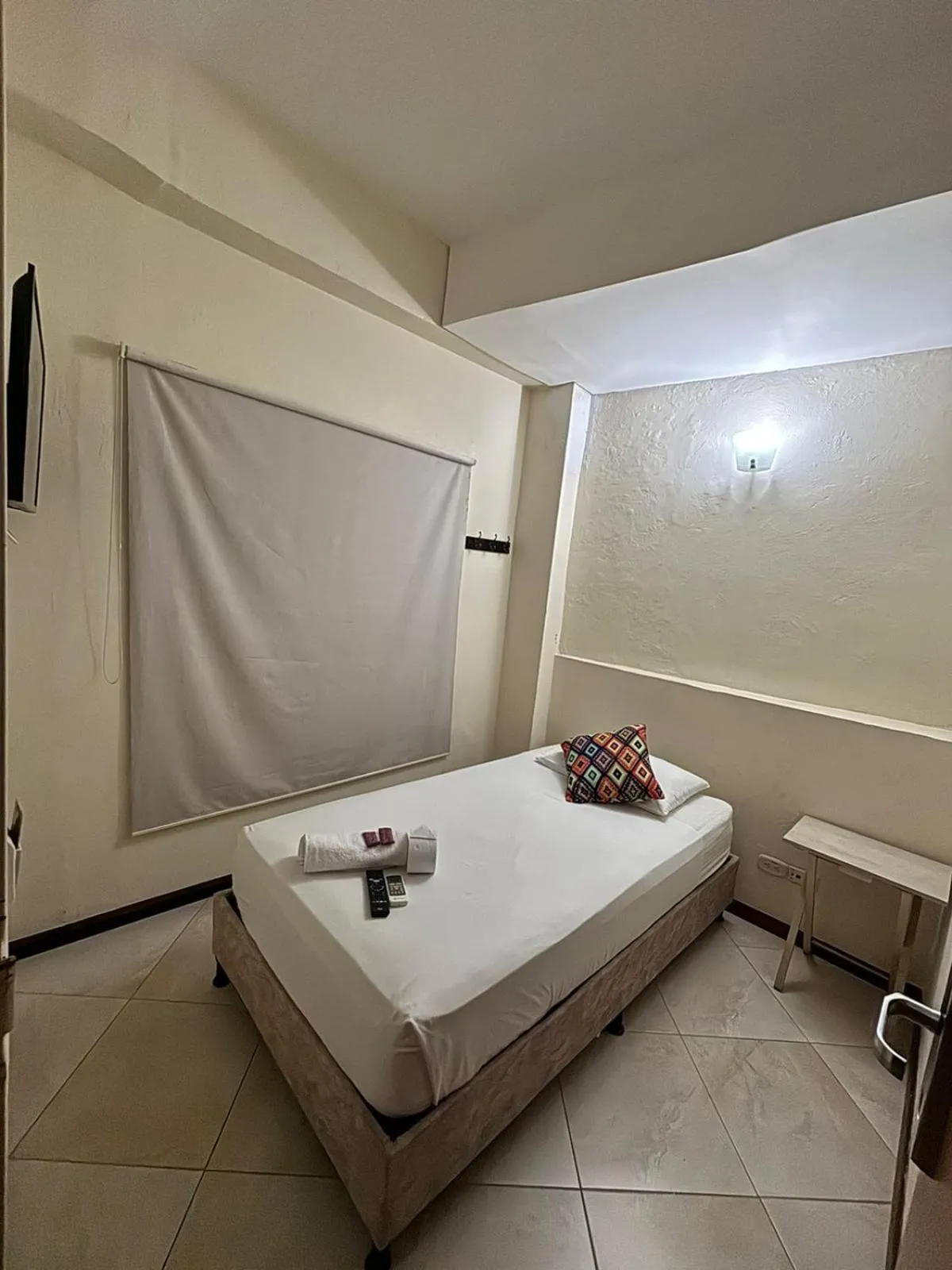 Bed in Hotel Tierra Santa Santa Fe de Antioquia