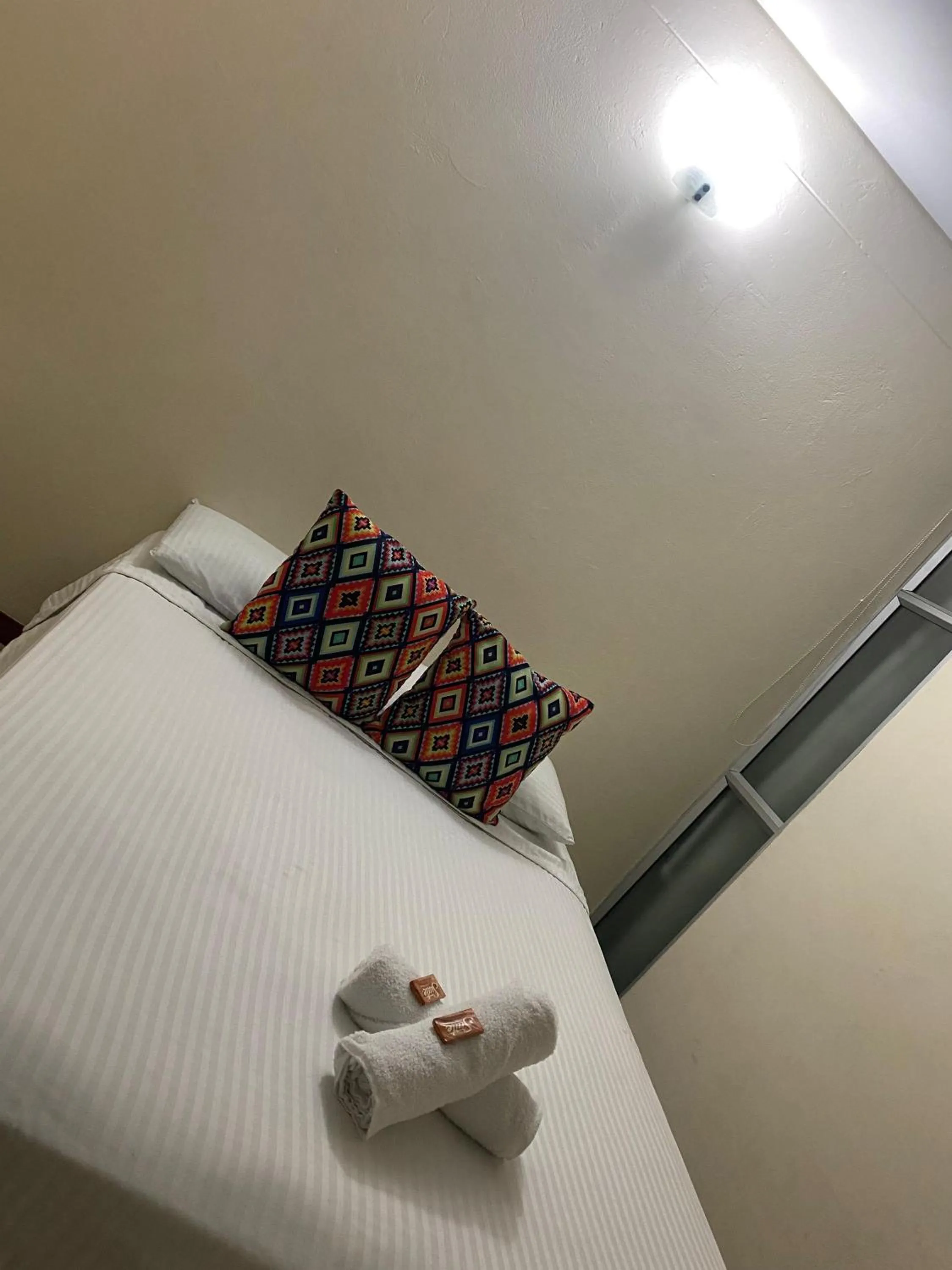 Bed in Hotel Tierra Santa Santa Fe de Antioquia