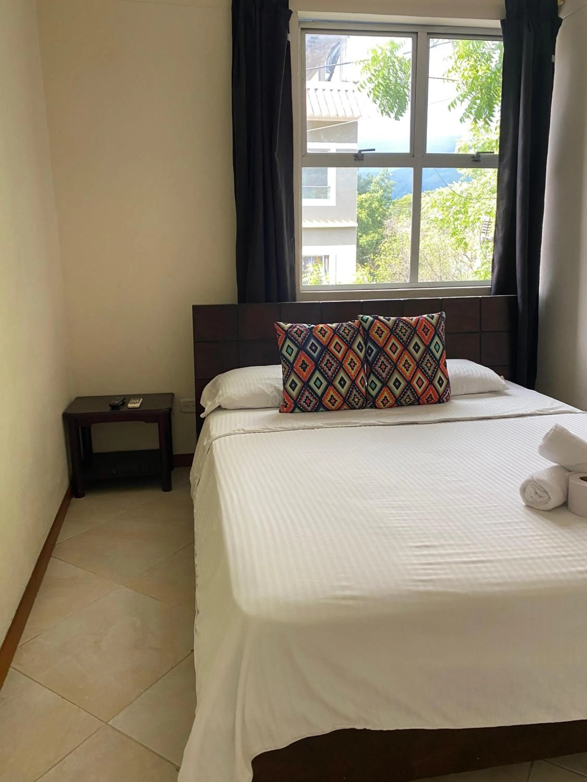 Bed in Hotel Tierra Santa Santa Fe de Antioquia